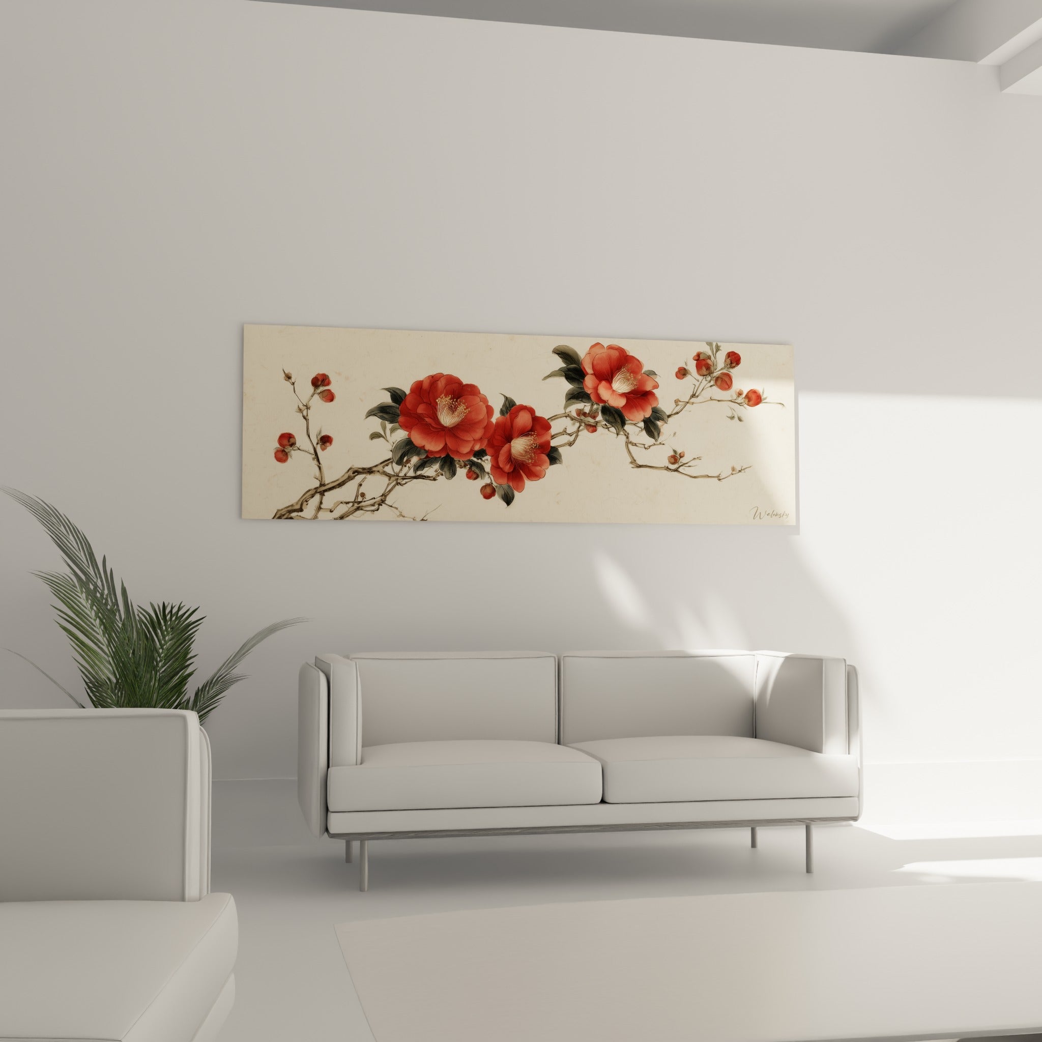 Fleurs de camélia rouge et bourgeons terracotta sur fond ivoire, accrochées au-dessus d'un canapé dans un salon lumineux