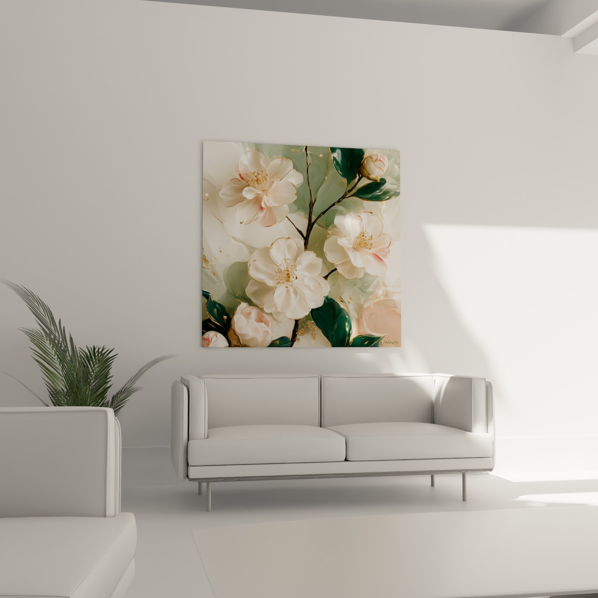 Fleurs de camélia crème et rose ornées de liserés dorés au-dessus d'un canapé dans un salon lumineux