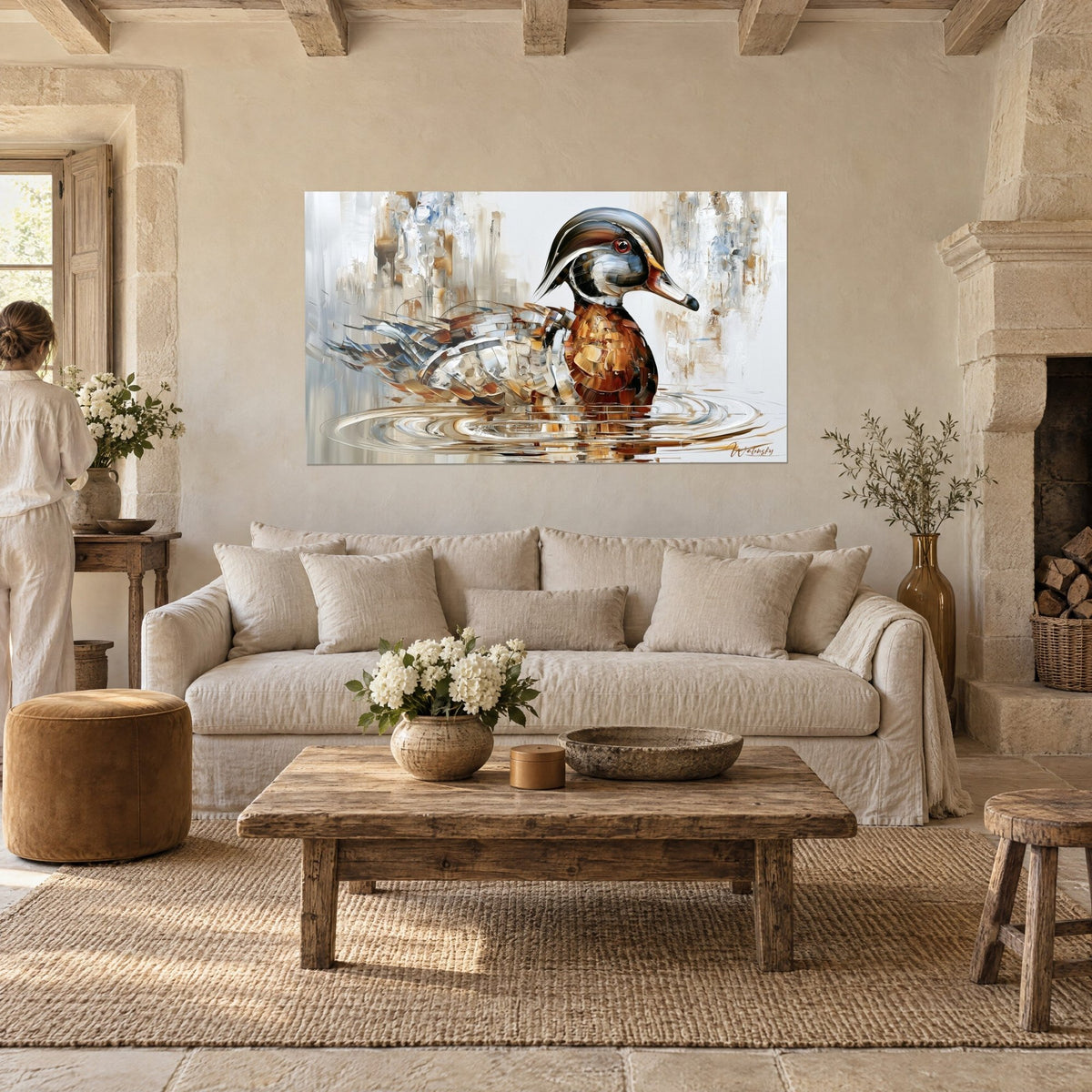 Wall art of a mandarin duck with brown and white plumage, red eye, silver circles on the water, above a sofa in a bright living room