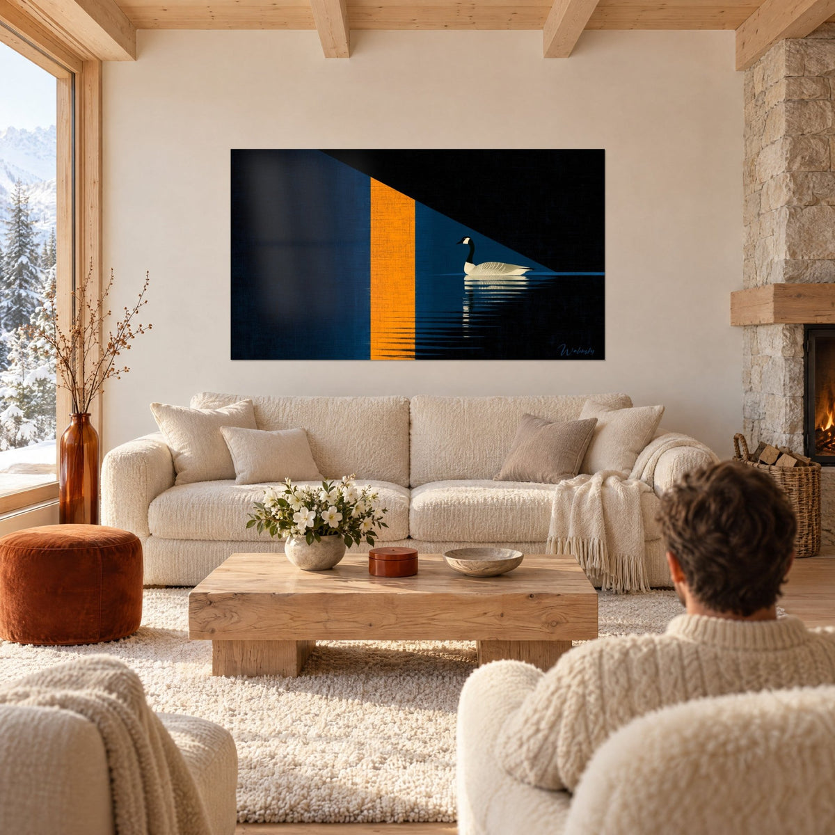 Tableau bernache du Canada glissant sur l'eau noire, bande orange vif sur fond bleu nuit, au-dessus d'un canapé dans un salon lumineux
