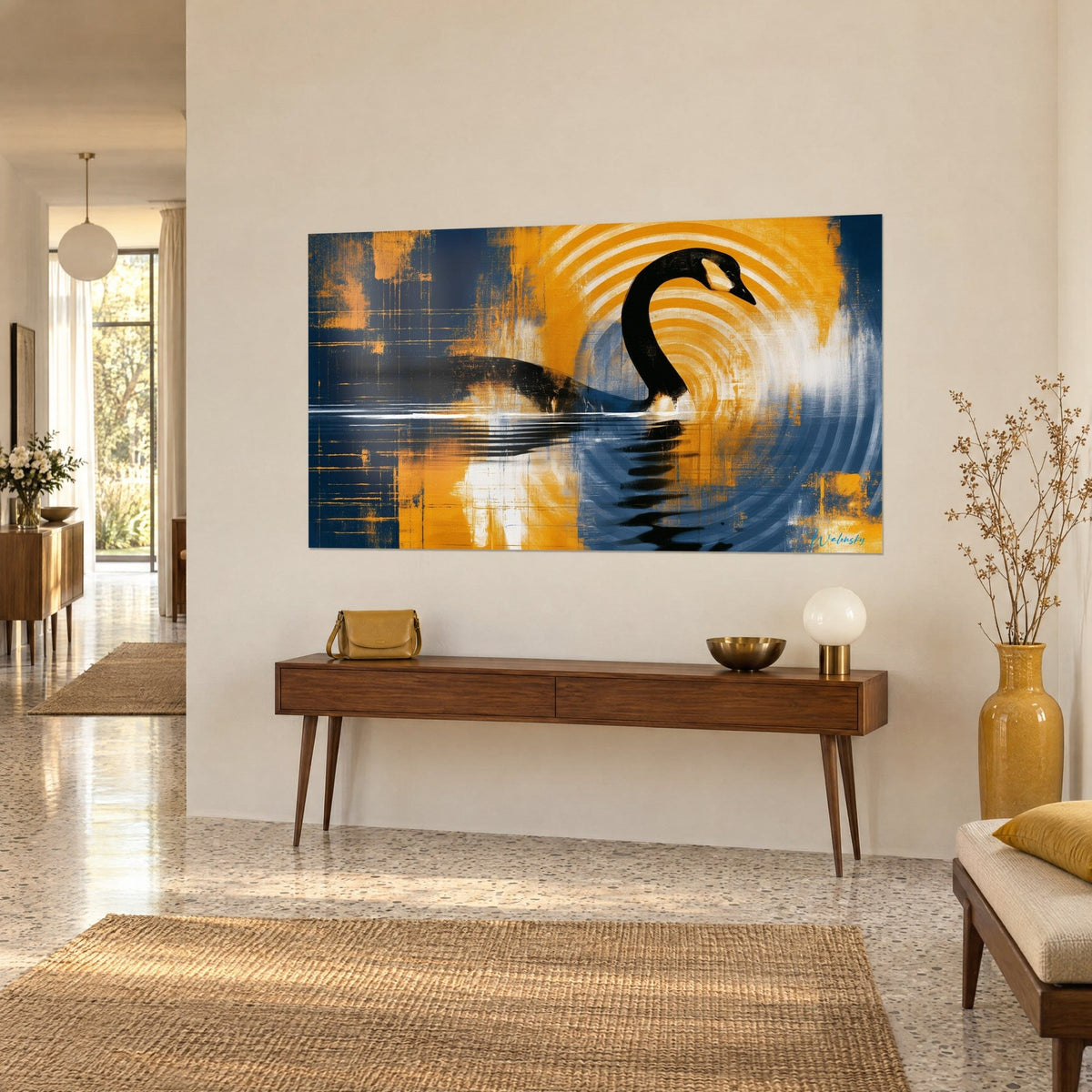 Tableau oiseau d'eau en silhouette d'encre, cercles concentriques blancs et or sur fond marine, accroché au-dessus d'une console en bois