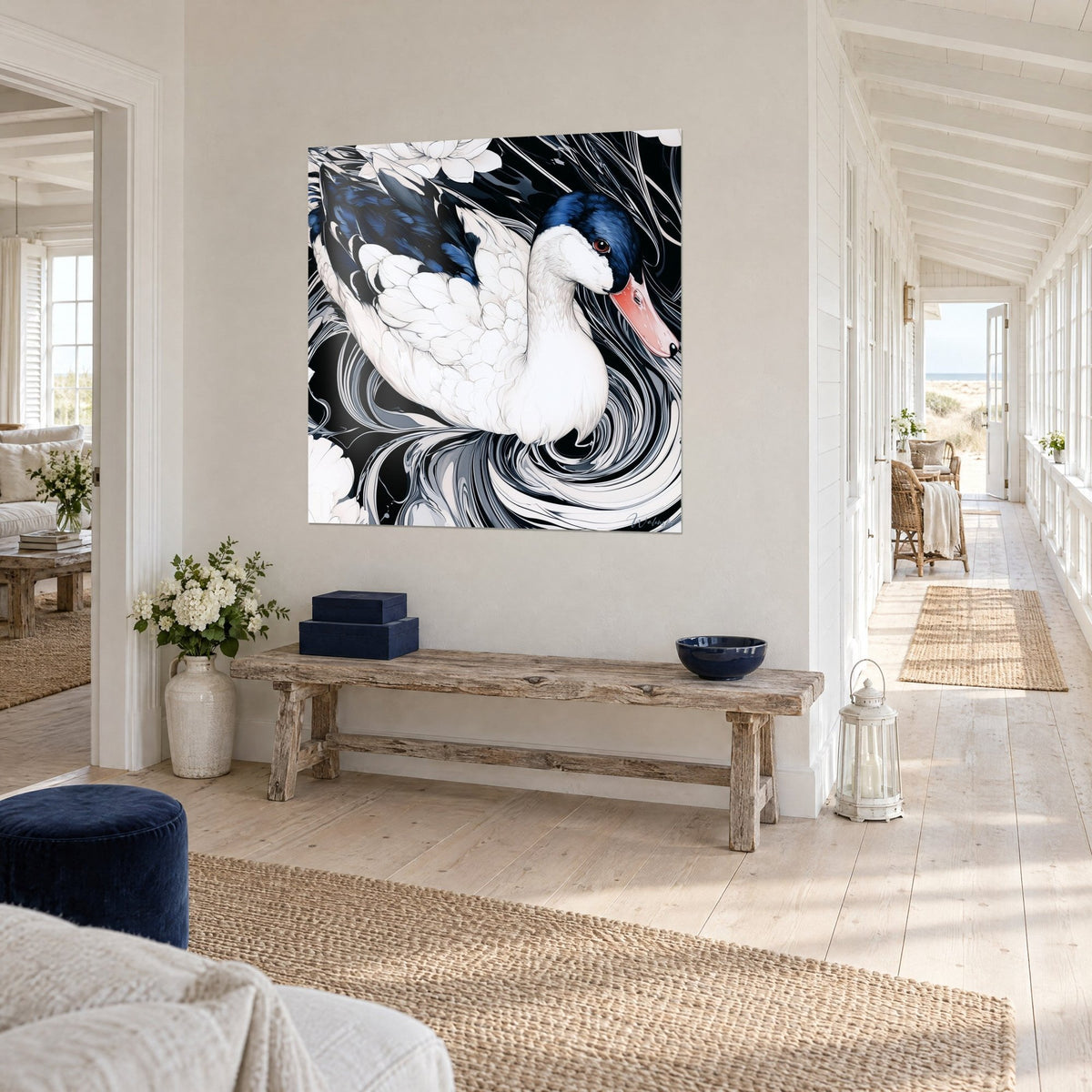 Tableau oiseau aquatique au plumage ivoire, dos indigo et bec rosé, accroché dans un couloir clair près d'une banquette