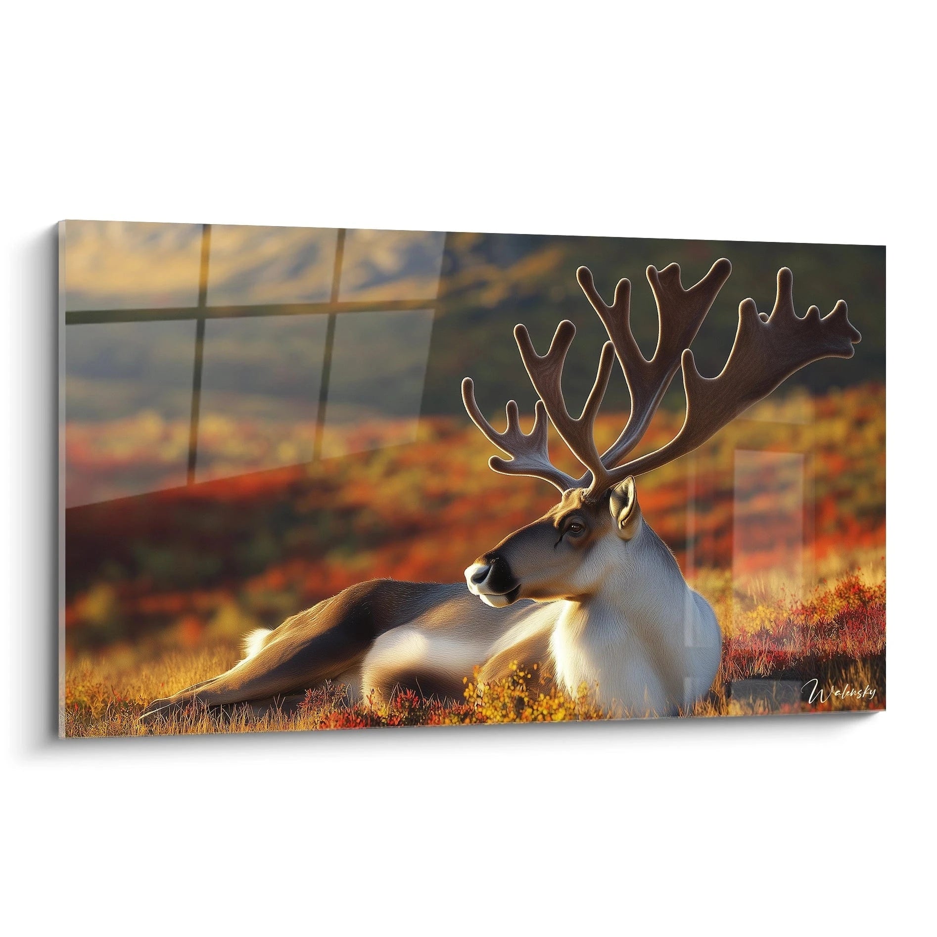 Un tableau artistique abstrait représentant un caribou majestueux au repos sur un tapis de végétation automnale. Teintes orangées, beiges et marron dominent la composition, avec un jeu de lumière doré illuminant le pelage de l'animal aux bois imposants.
