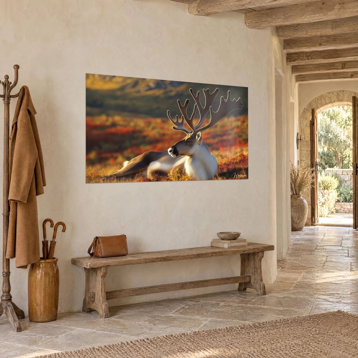 Wall art reindeer lying in ochre and red tundra, three-quarter view on a stone wall, beside an arch