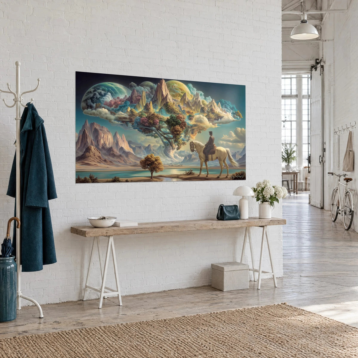 Tableau jardin aérien flottant, montagnes ocre et ciel turquoise, accroché en trois-quarts au-dessus d'une console en bois, loft d'artiste