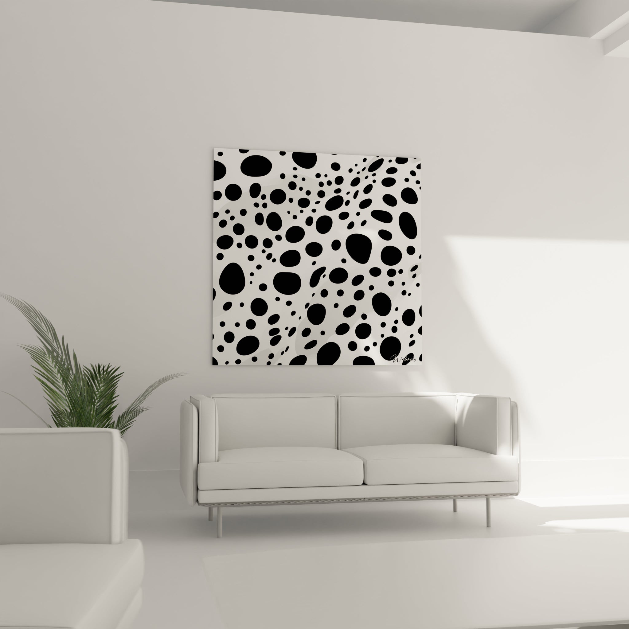 Tableau tacheté noir et blanc de Walensky accroché sur un mur blanc dans un salon moderne