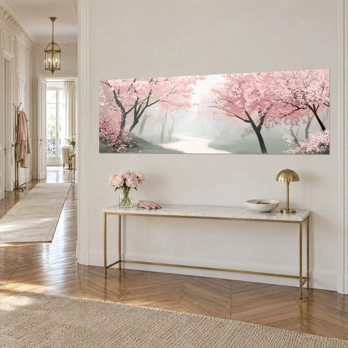 Wall art alley of powdery cherry trees in the mist, black trunks and tender pink, above a gilded console in a Haussmann-style hallway