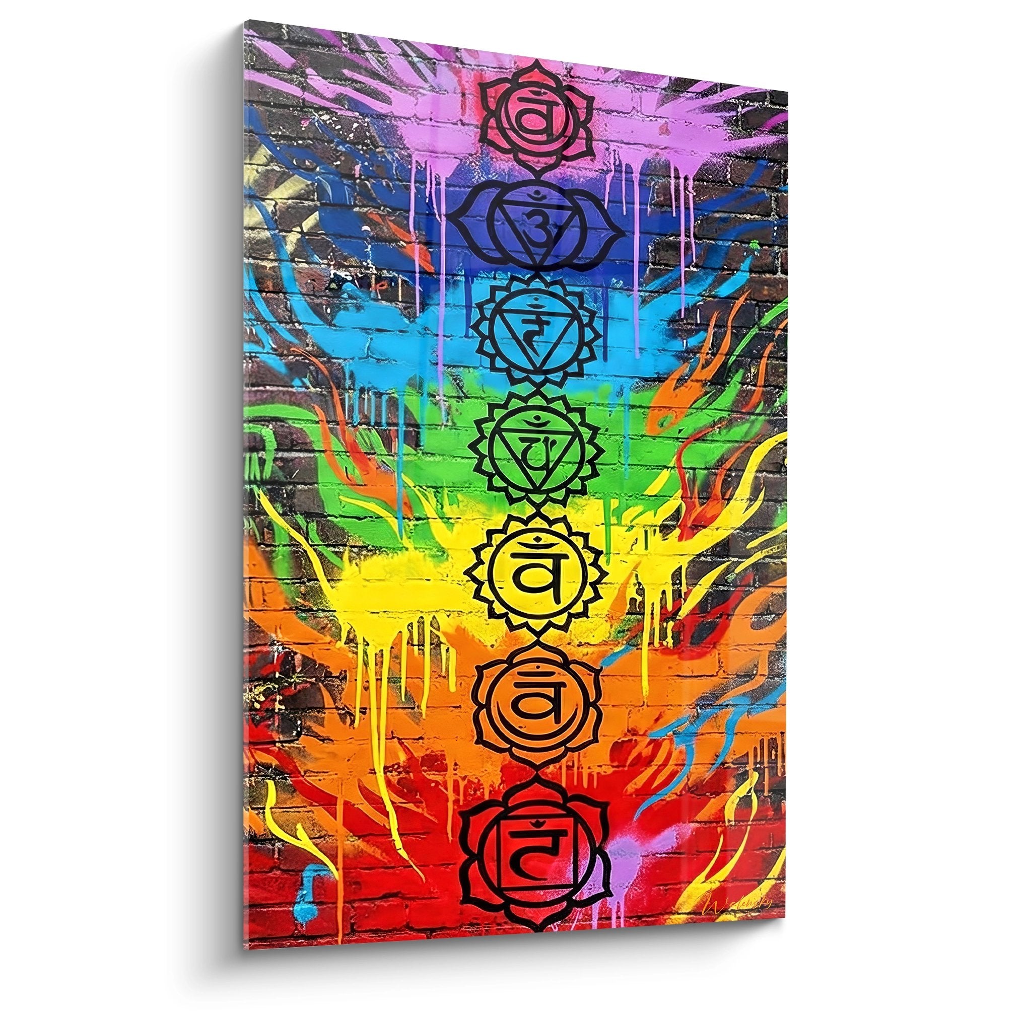 Tableau moderne des chakras avec symboles colorés alignés verticalement sur mur de brique urbain graffé
