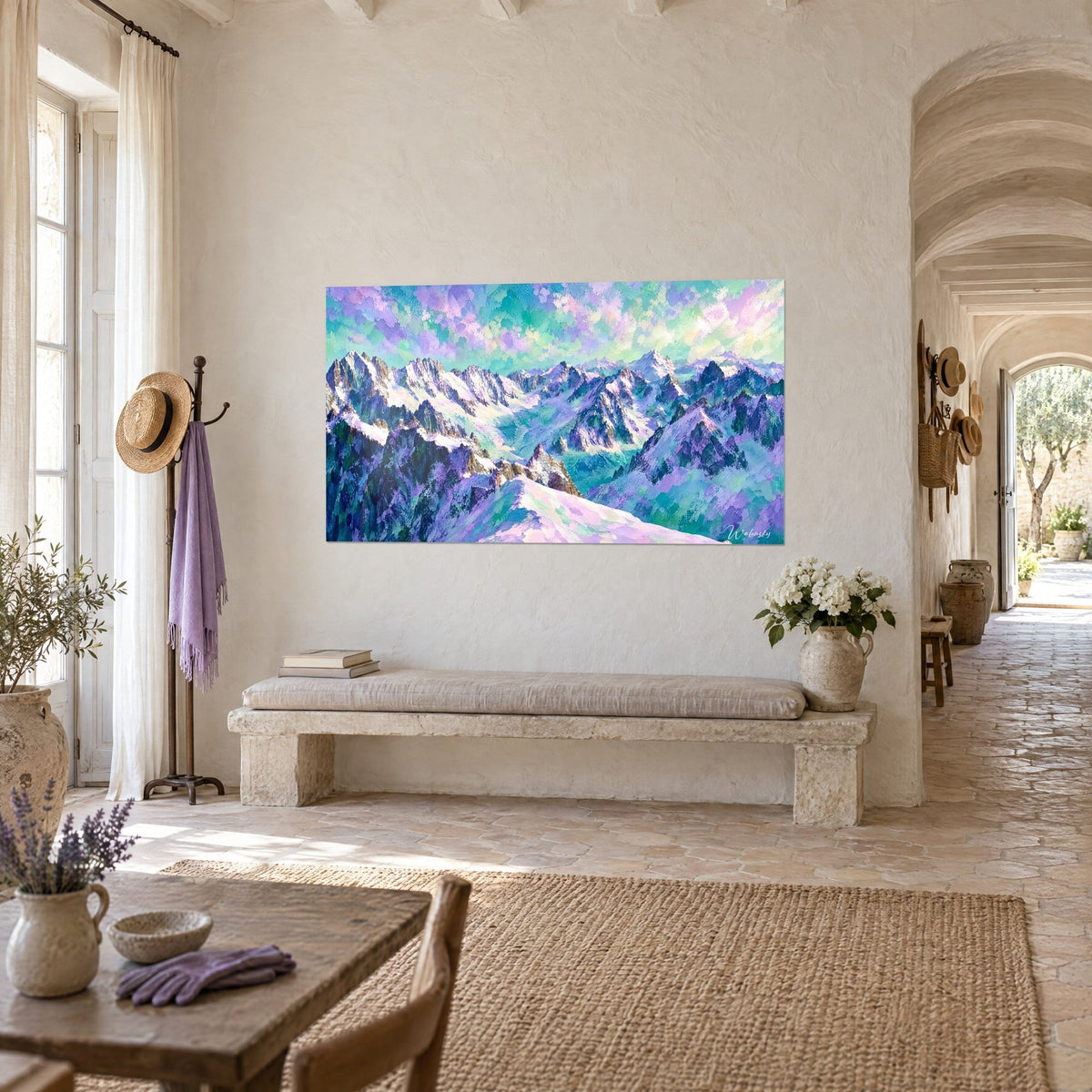 Tableau chaîne de sommets givrés mauve et vert d'eau, ciel pastel rose, accroché au-dessus d'un banc de pierre dans un mas provençal