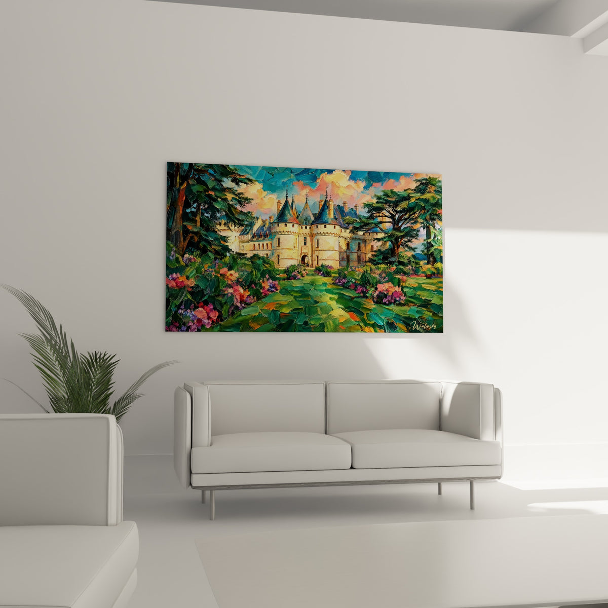 Façade ocre et ciel rosé du Château de Chaumont-sur-Loire au-dessus d'un canapé dans un salon lumineux