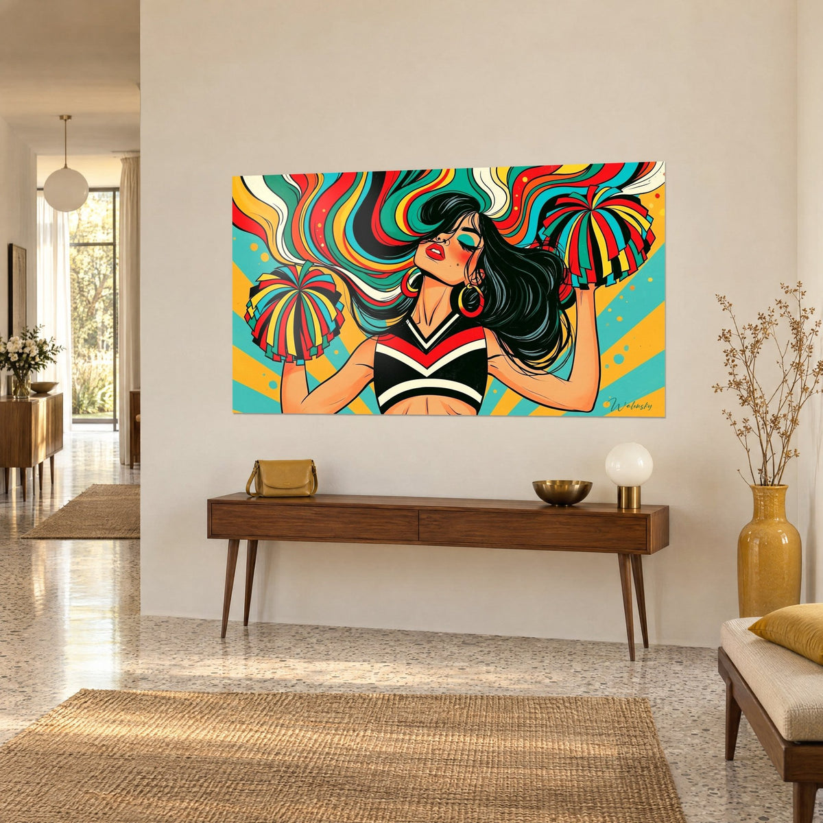 Pop art wall art of a cheerleader, black and white top with red chevron stripes, large gold hoop earrings, on a beige wall above a wooden console