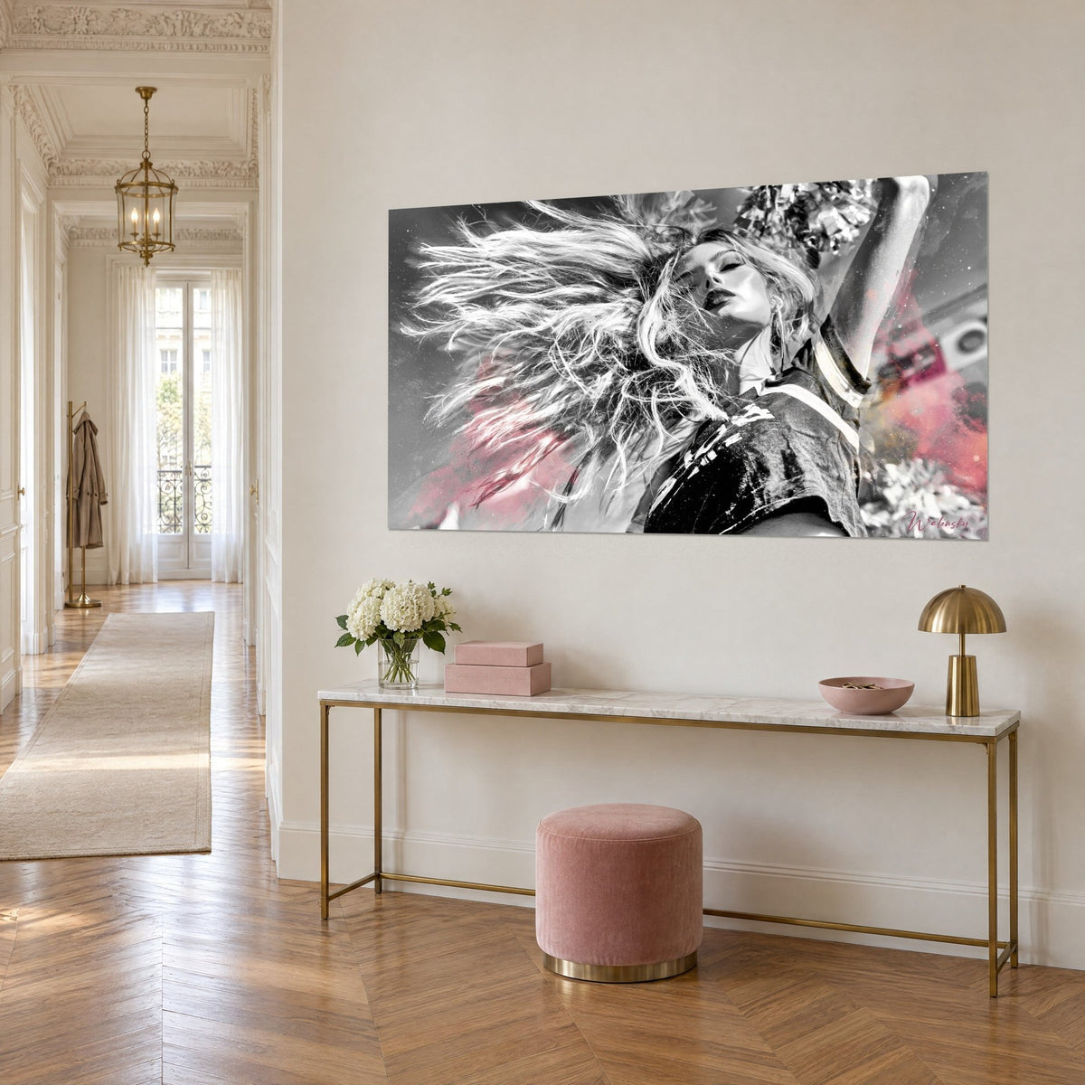 Wall art of tousled hair in motion, face with eyes closed, dark tank top and coral pink clouds, Haussmann-style gilded console