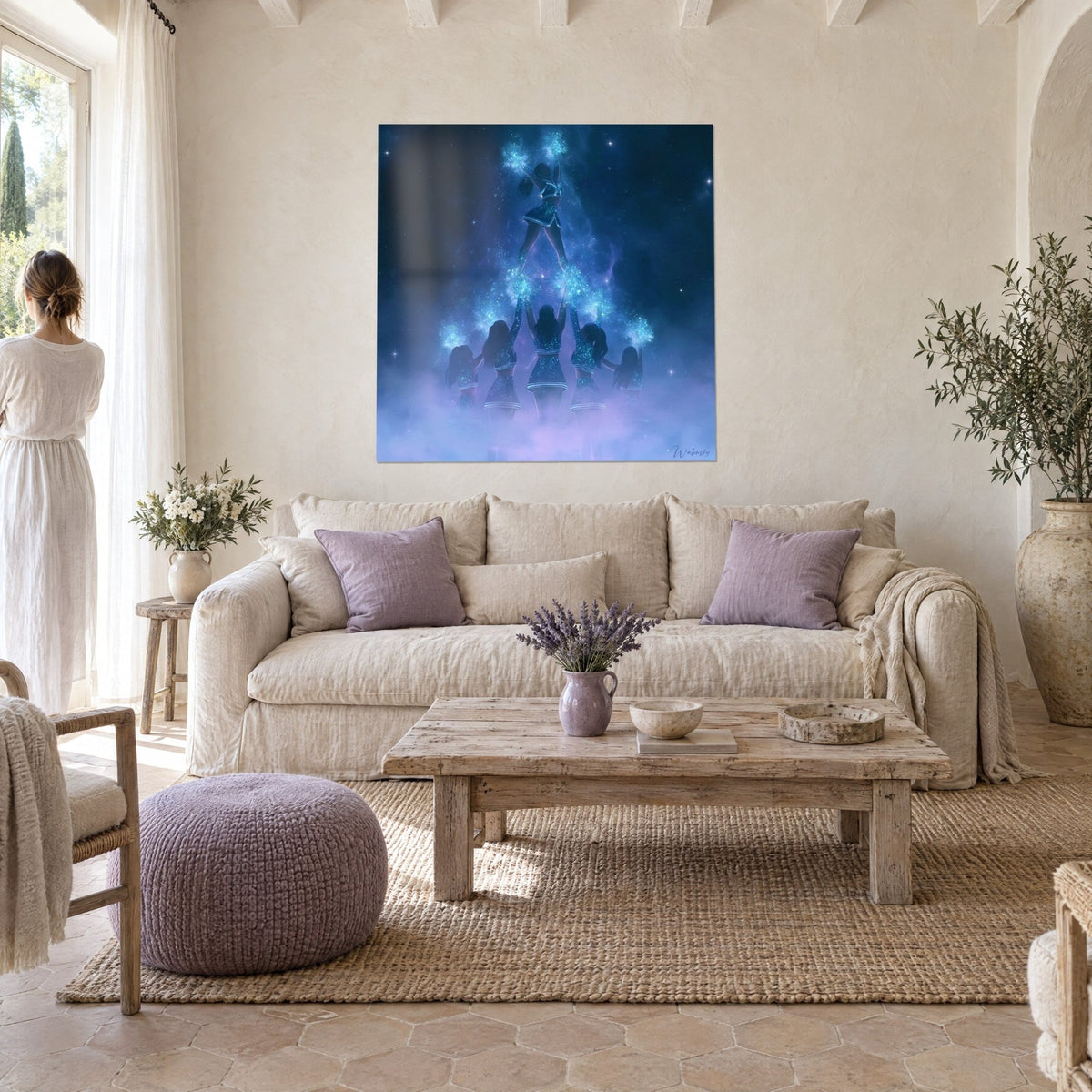 Wall art pyramid of cheerleaders in midnight blue skirts, sparkling turquoise pom-poms, violet nebula, above a sofa in a bright living room