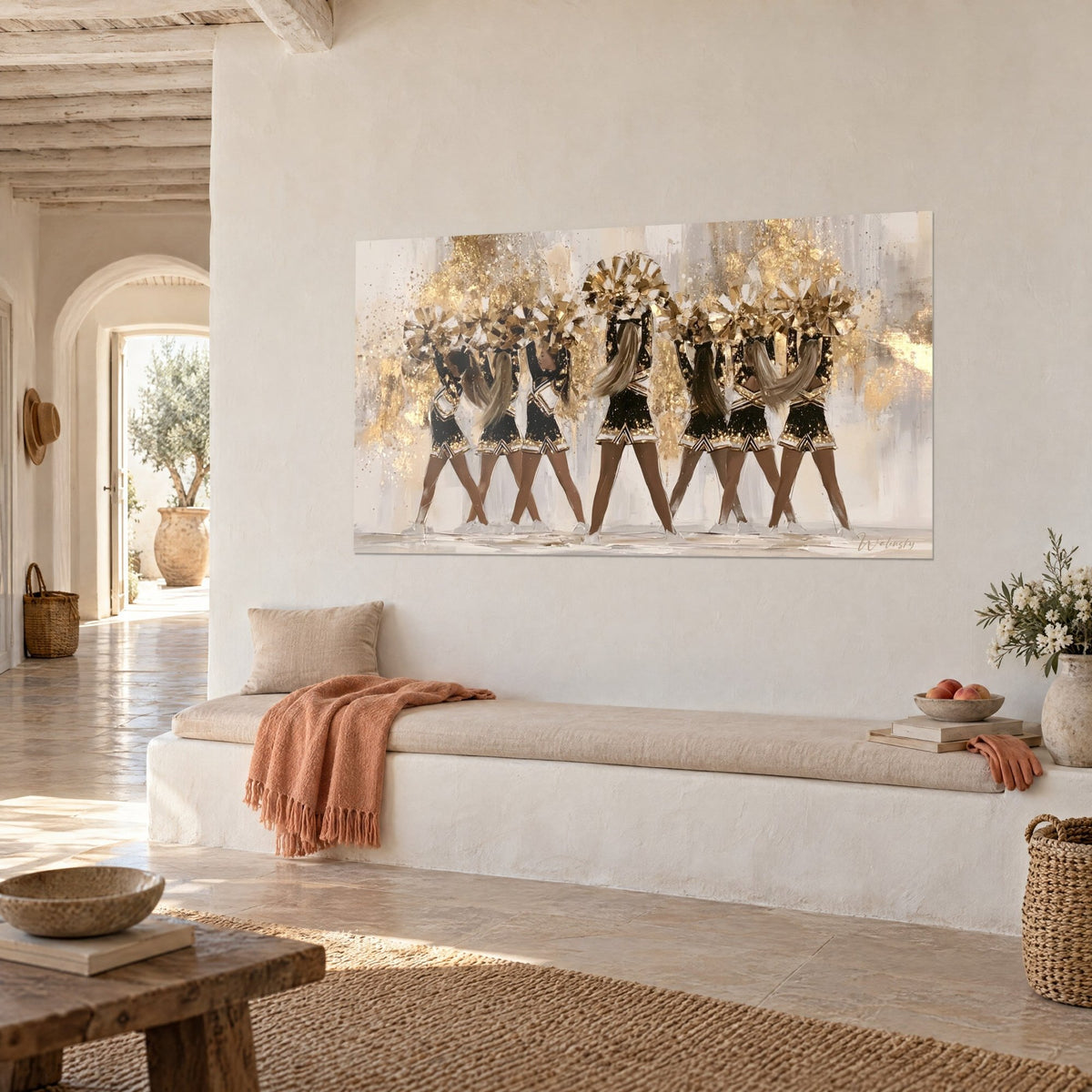 Wall art of cheerleaders in a line, gold pom-poms and light chestnut hair on ivory background splashed with gold, three-quarter view, white bench