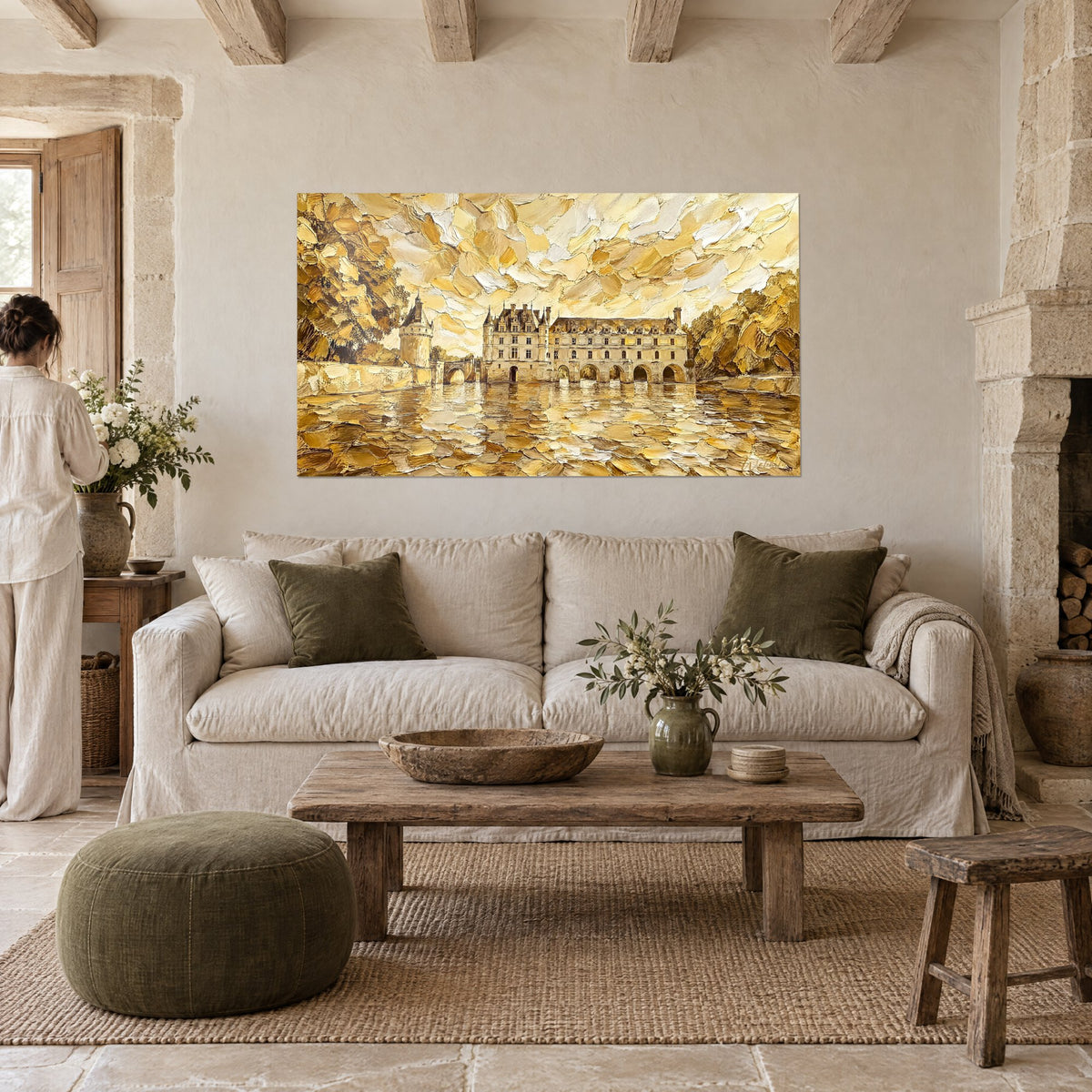 Tableau château de Chenonceau en pâte ocre et ivoire, arches reflétées, au-dessus d'un canapé dans un salon lumineux