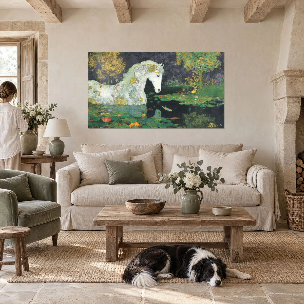 Wall art white mossy horse bending over a pond of green and orange water lilies, above a sofa in a bright living room
