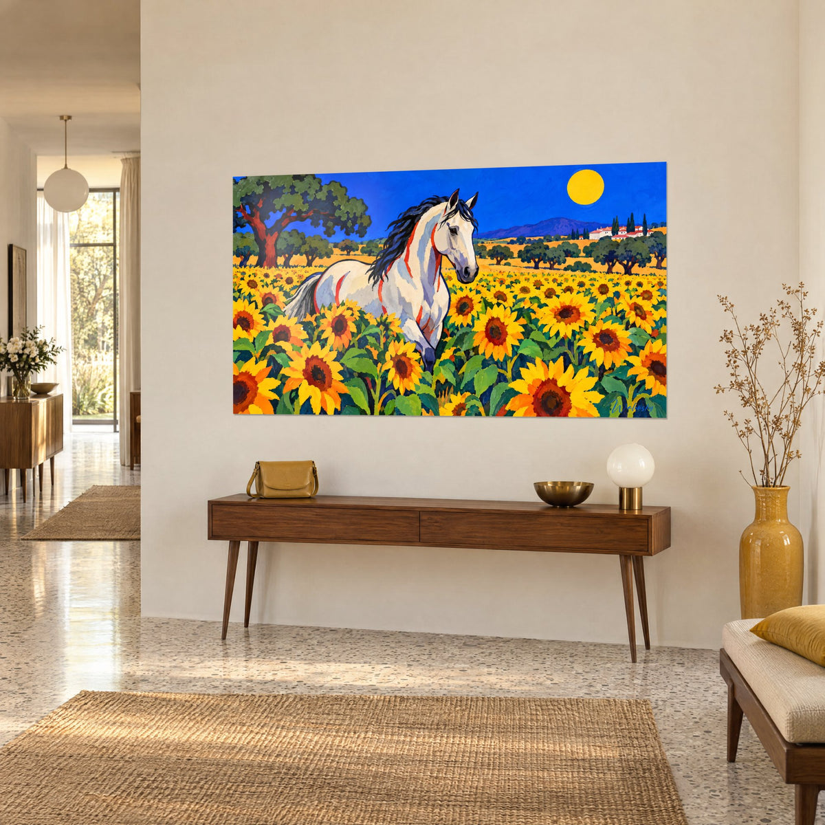 Tableau étalon lusitanien aux liserés rouges, soleil jaune sur ciel bleu cobalt, accroché au-dessus d'une console en bois