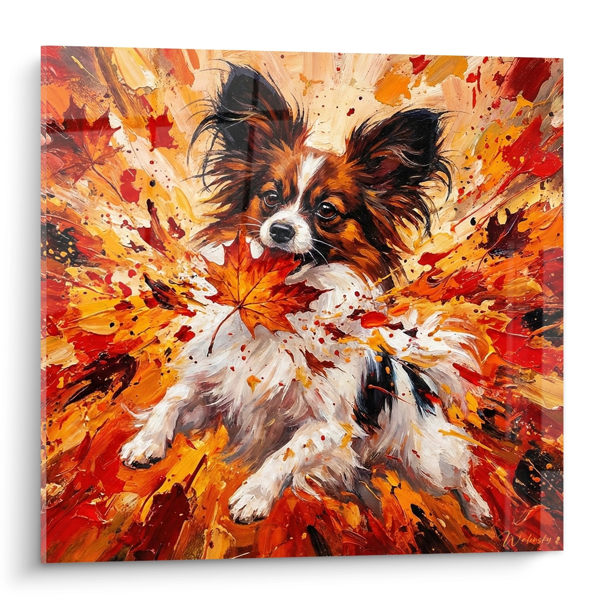 Tableau chien papillon tricolore avec oreilles dressées dans explosion de couleurs automnales orange rouge