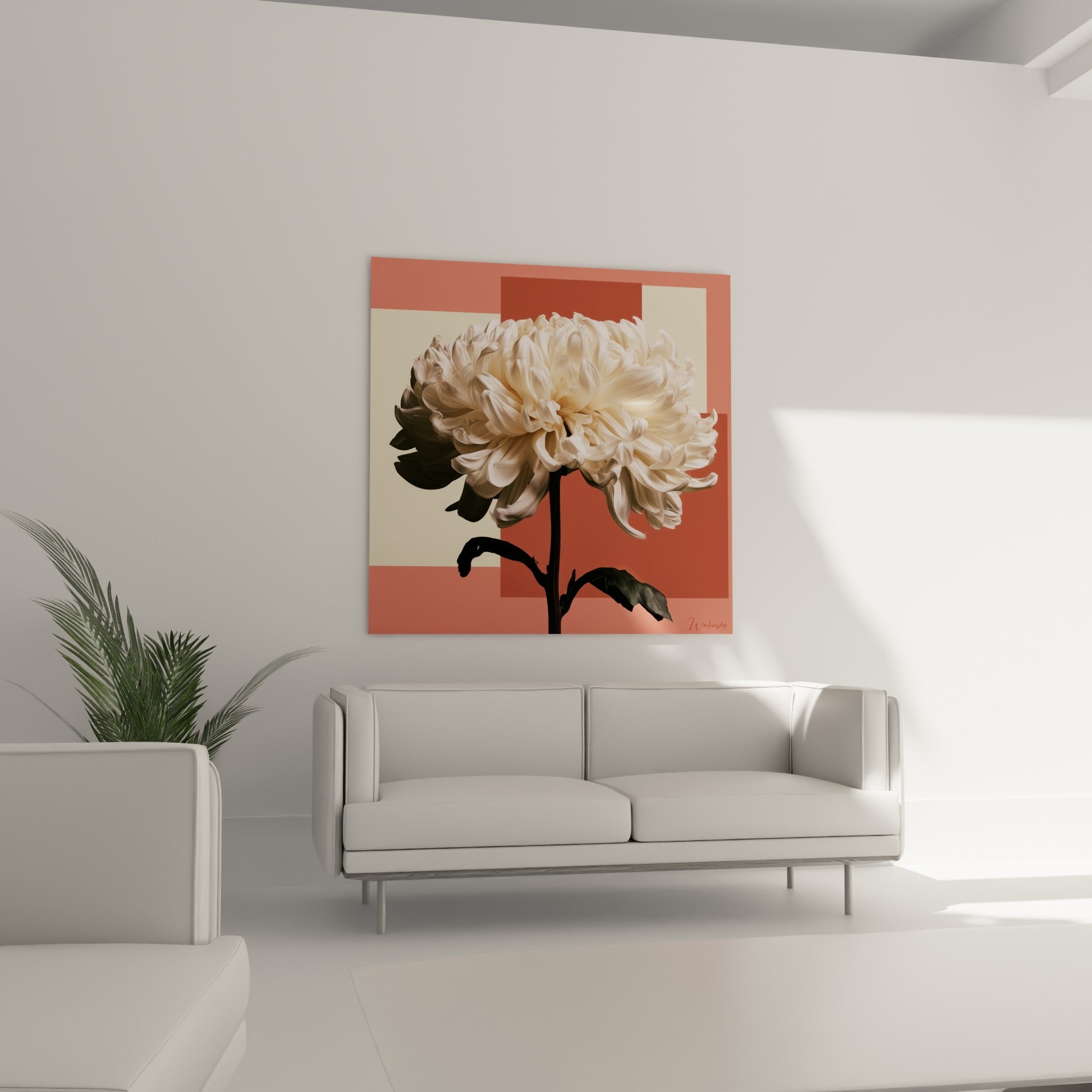 Fleur de chrysanthème blanc devant des blocs corail et crème au-dessus d'un canapé dans un salon lumineux