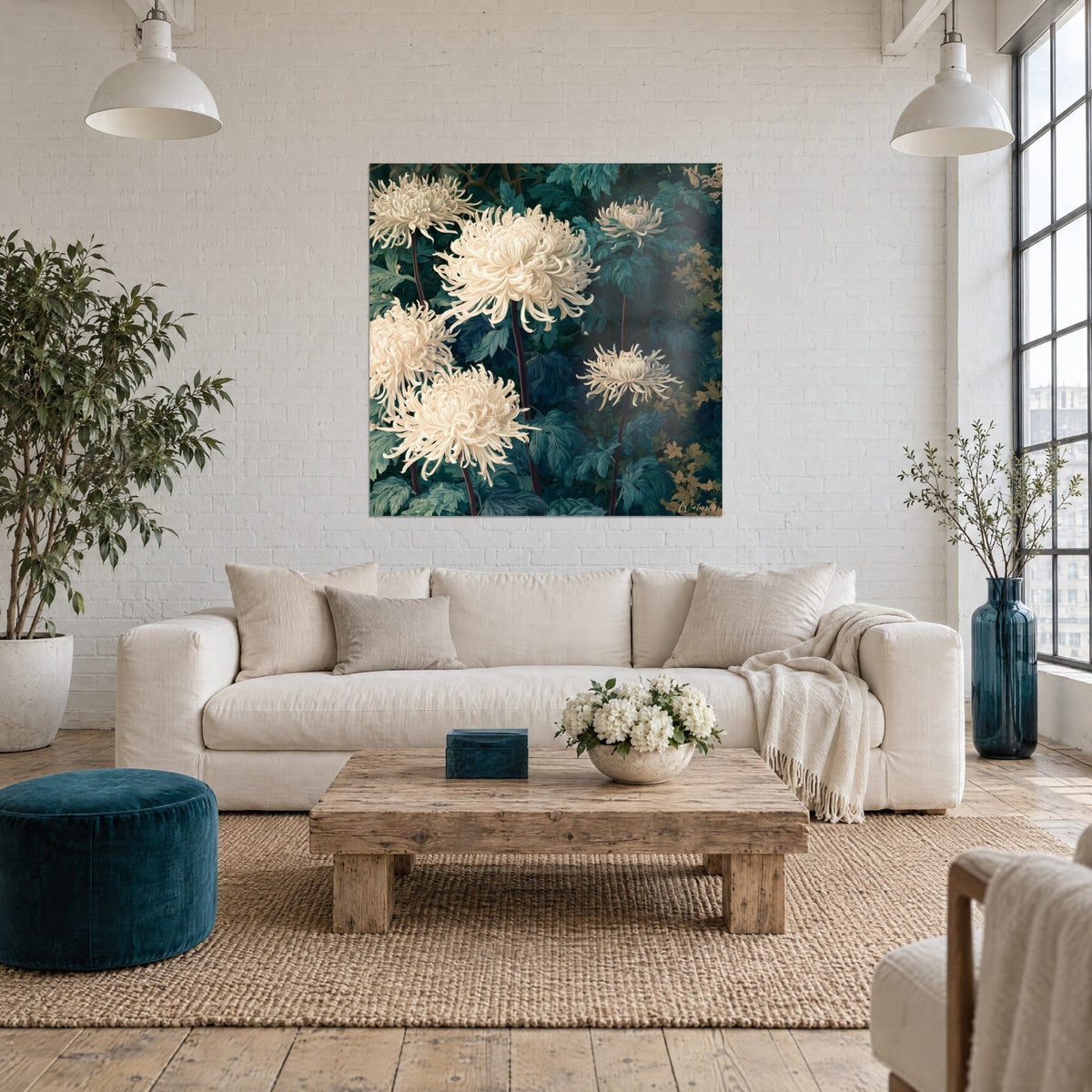 Wall art with ivory chrysanthemums with thread-like petals on fir-green foliage, purple stems, hung above a sofa in a bright living room