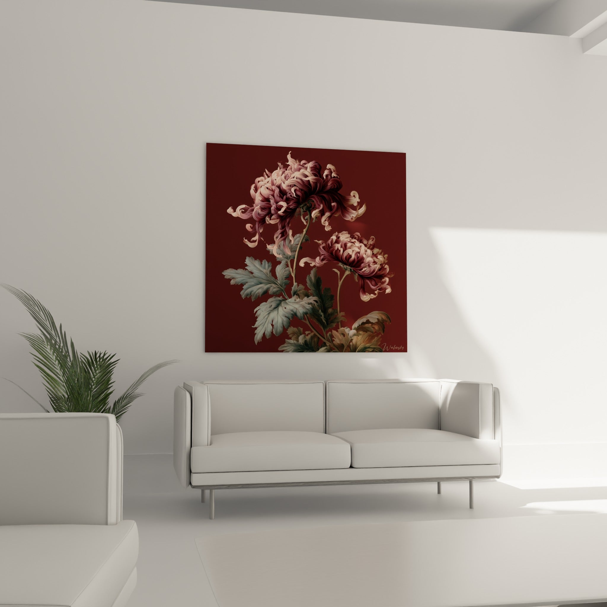 Corolle de chrysanthème bordeaux et ivoire suspendue au-dessus d'un canapé dans un salon lumineux