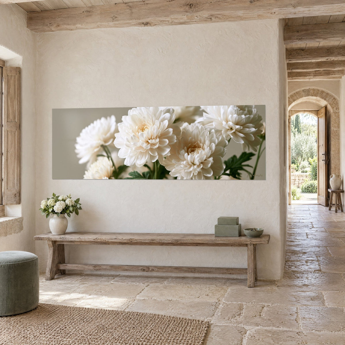 Wall art white chrysanthemums with cream centers, dark green leaves on a grey-green background, wooden bench and arched door, stone house