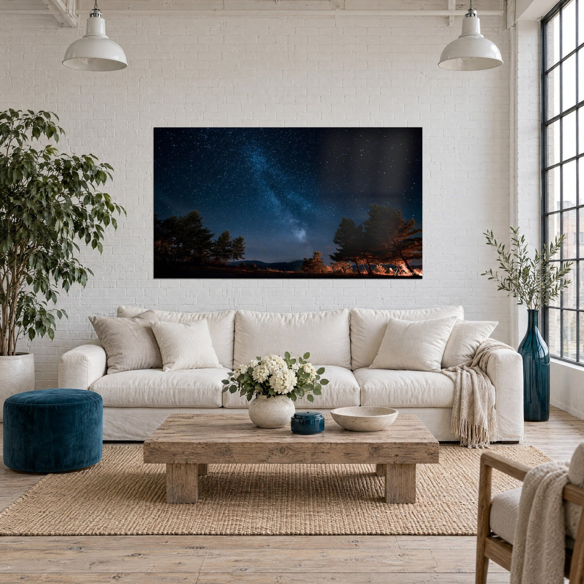 Wall art starry sky dome dotted with stars, midnight blue and copper orange on the pines, above a sofa in a bright living room
