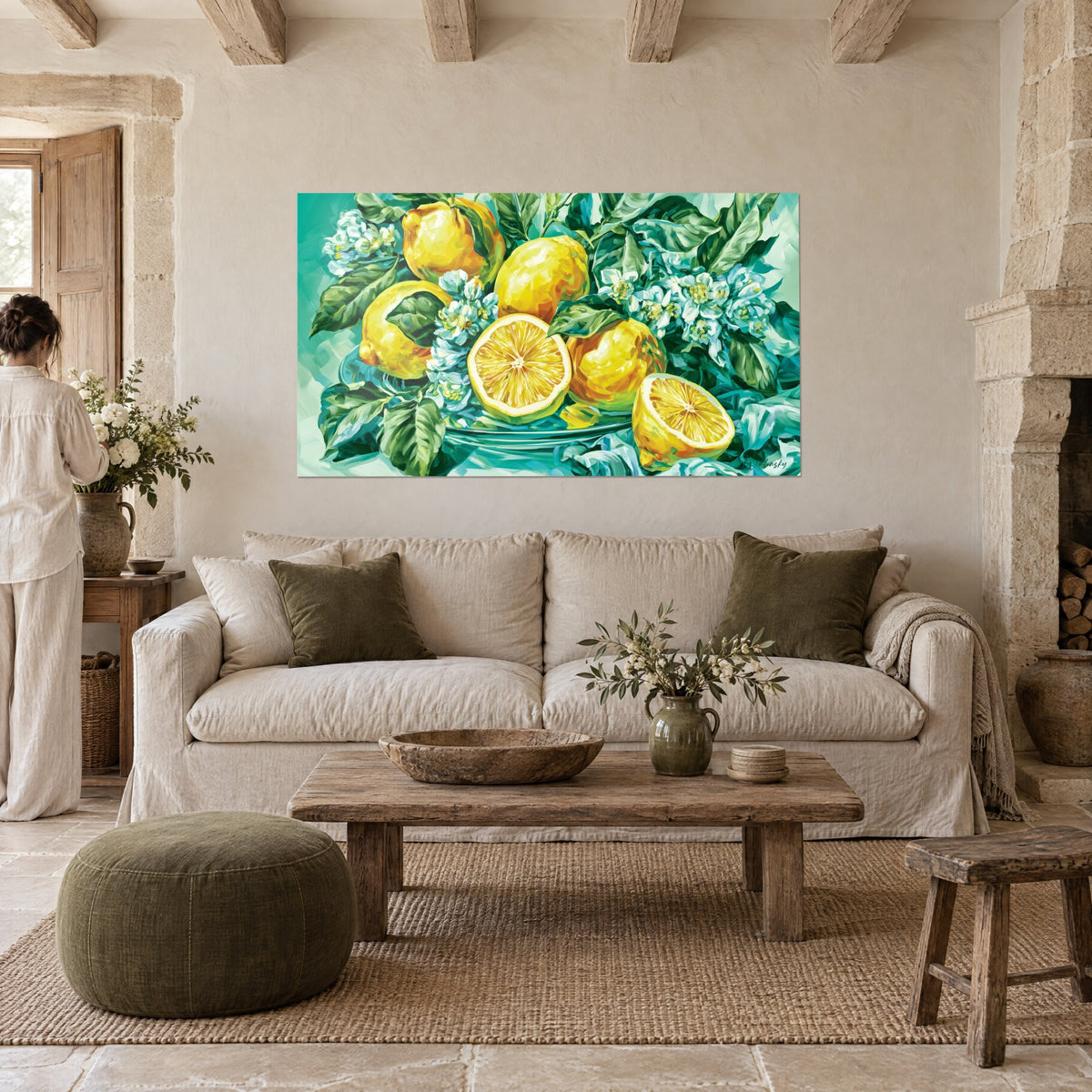 Tableau citrons jaunes éclatants entourés de feuilles vertes et fleurs blanches, au-dessus d'un canapé dans un salon lumineux