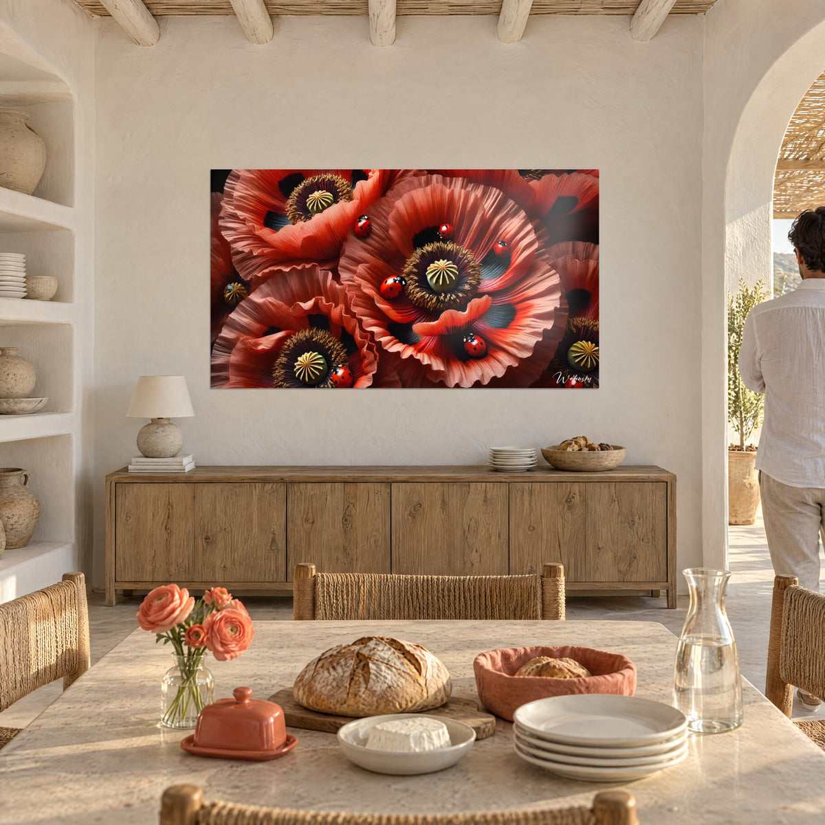 Wall art of a giant poppy flower with a star-shaped green seed pod and wavy vermilion petals, facing a sunny dining corner