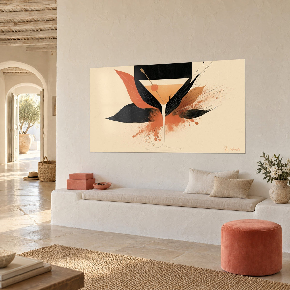 Tableau cocktail en coupe triangulaire, olive cerise et feuilles noires éclaboussées d'orange, vu de trois-quarts, banquette blanche