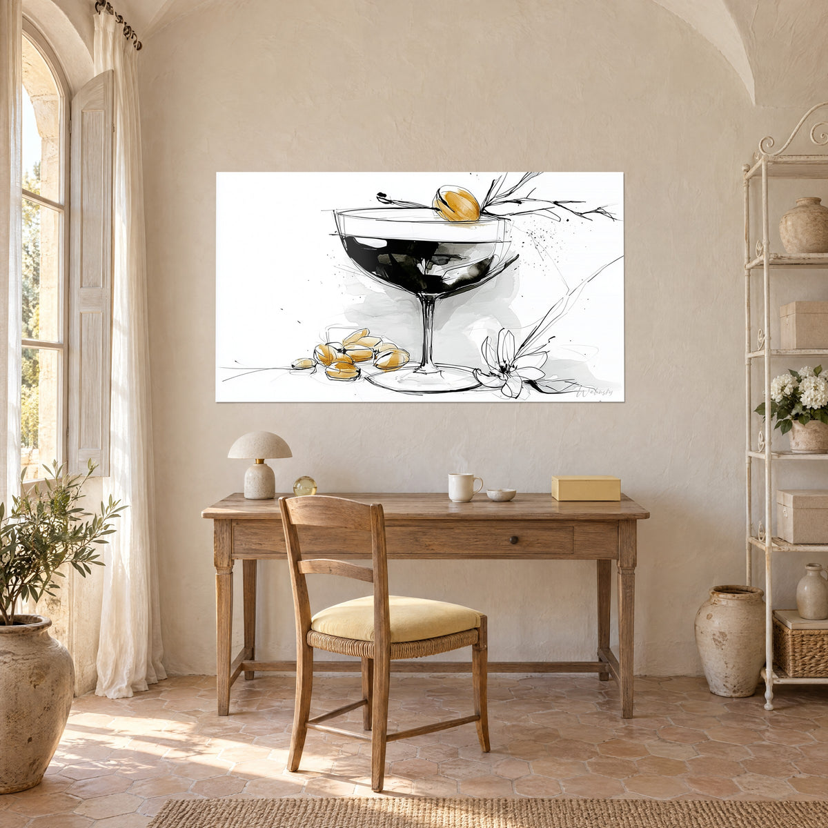 Πίνακας σκίτσο ενός μαύρου ποτηριού martini, αμύγδαλα σαφρανί και λευκά πέταλα, κρεμασμένος πάνω από γραφείο από ανοιχτόχρωμο ξύλο