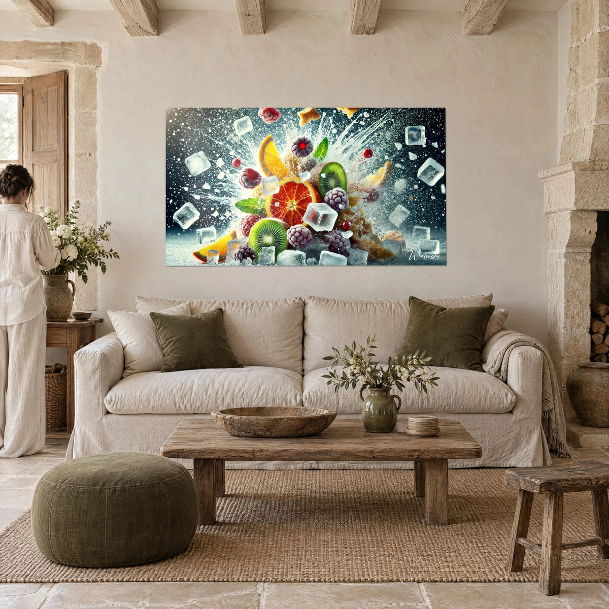 Tableau explosion de fruits givrés, orange sanguine rouge et kiwi vert, glaçons en suspension, au-dessus d'un canapé dans un salon lumineux