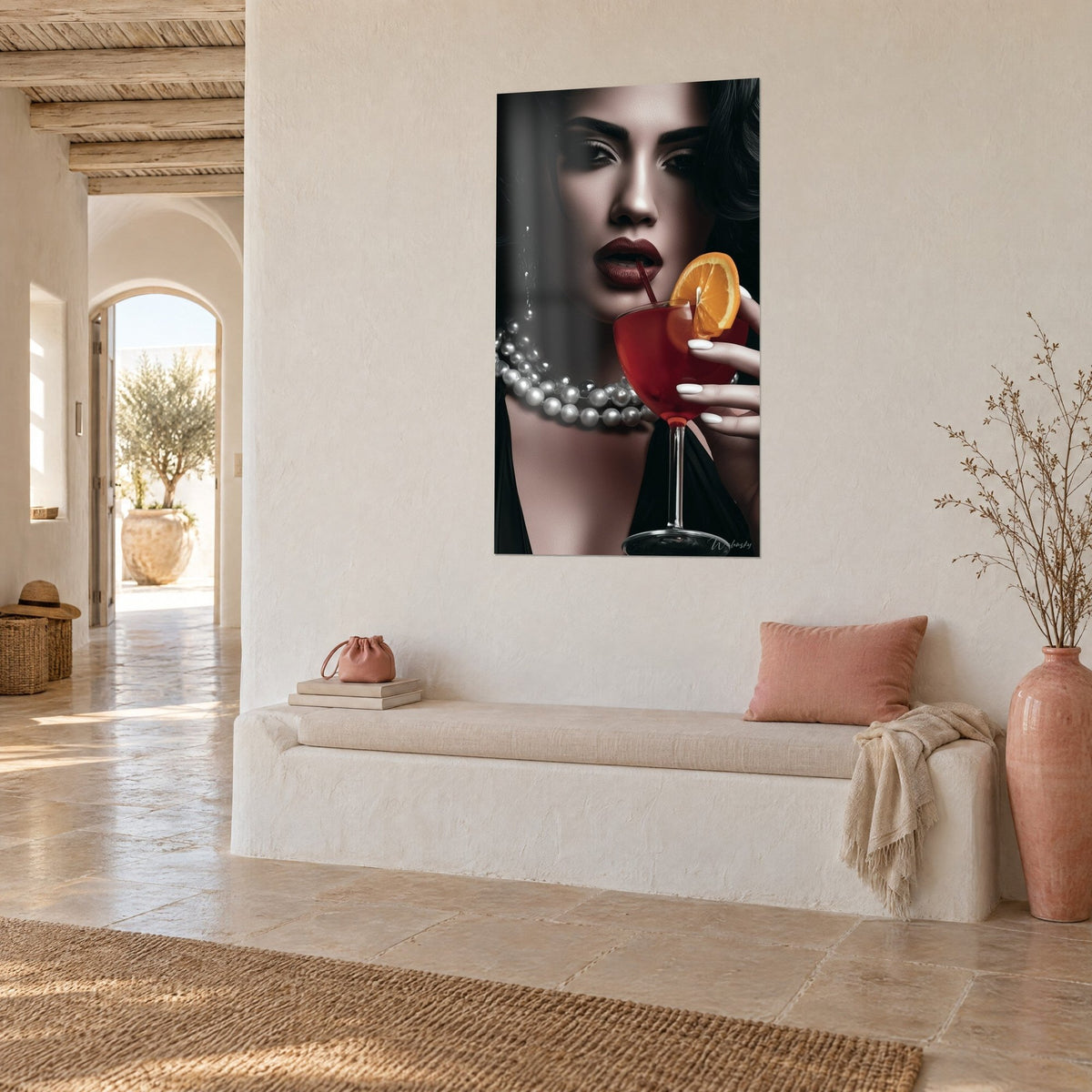 Wall art elegant brunette in black and white, vivid orange slice on a red glass, silver pearls, cream wall of a Mediterranean house