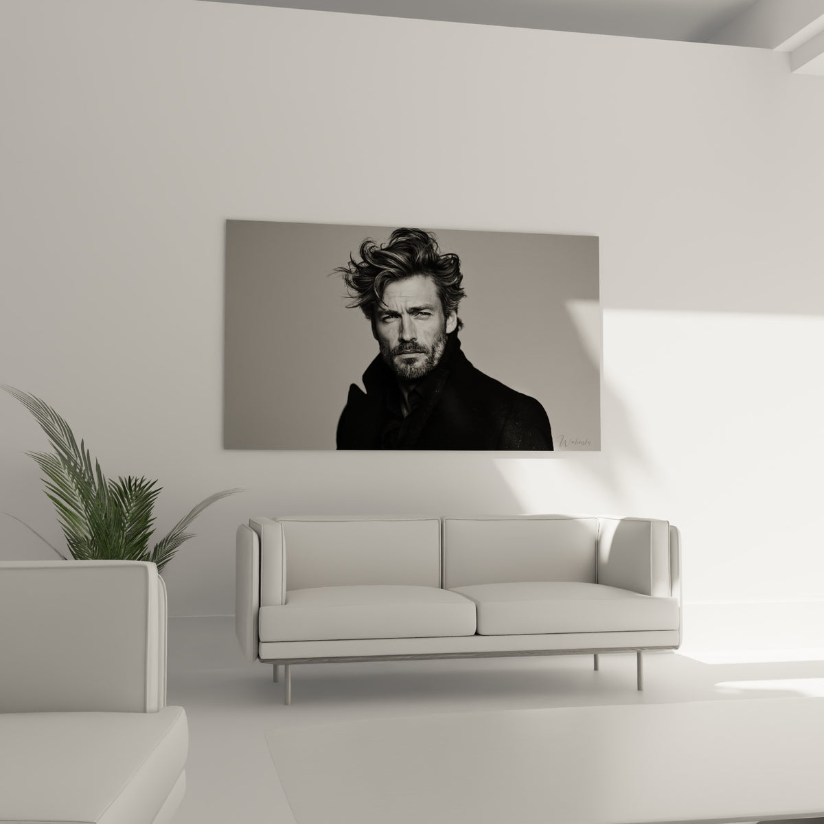 Visage barbu aux traits marqués, contraste noir et gris, au-dessus d'un canapé dans un salon lumineux