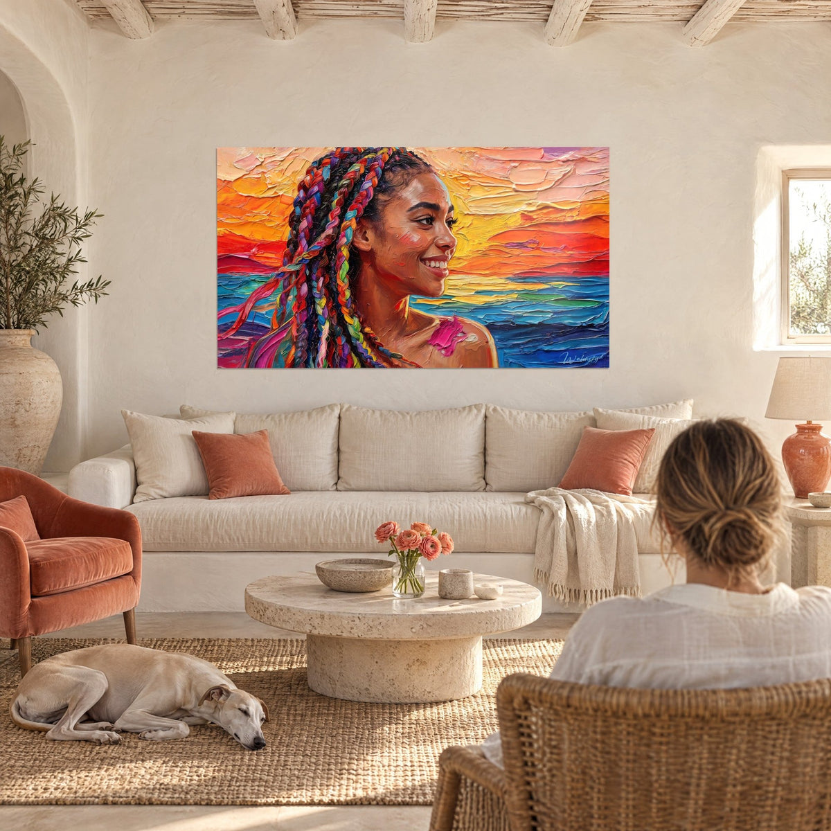 Wall art smiling portrait with rainbow braids, orange sky and blue sea, above a sofa in a bright living room