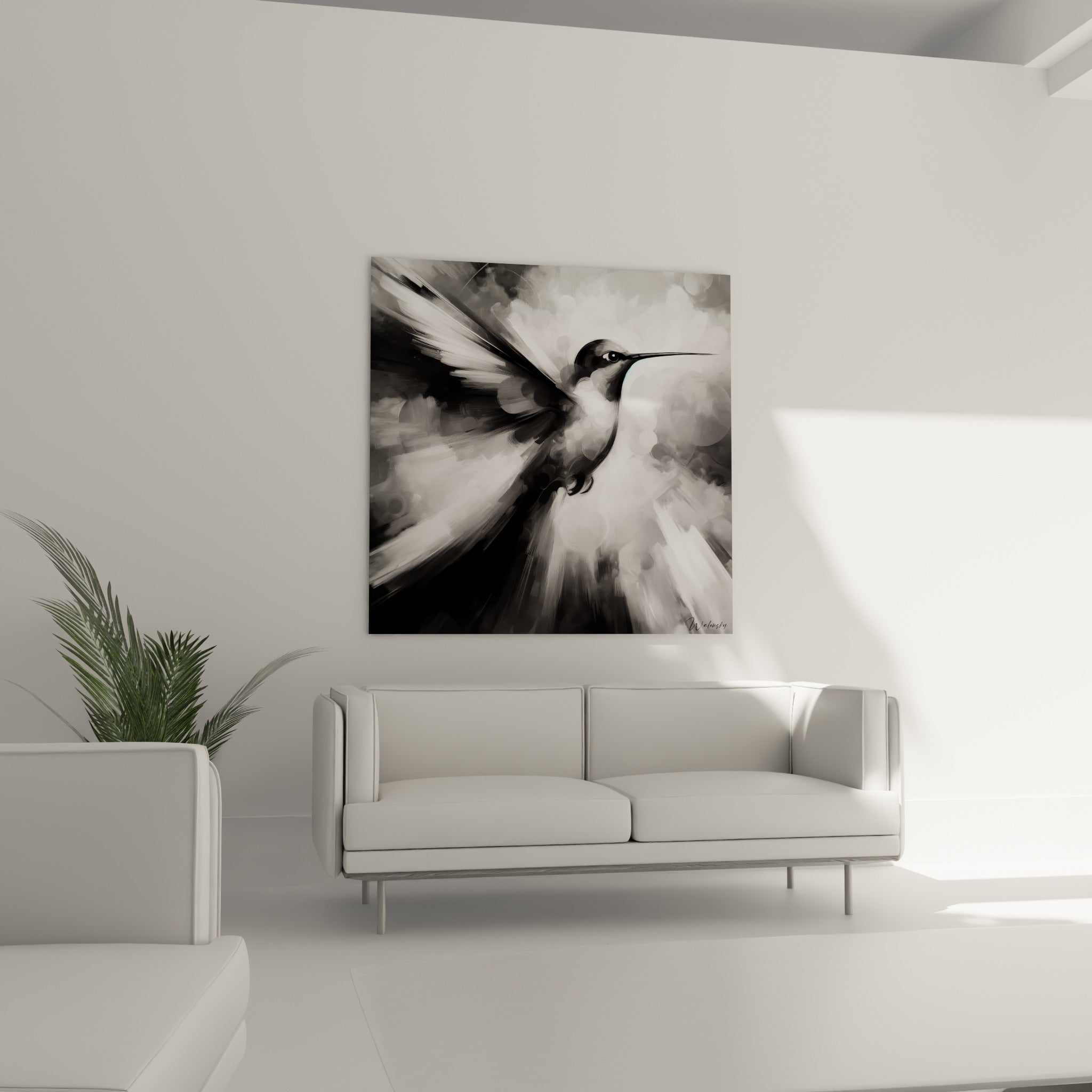 Silhouette de colibri anthracite et argenté en mouvement, placée au-dessus d'un canapé dans un salon lumineux