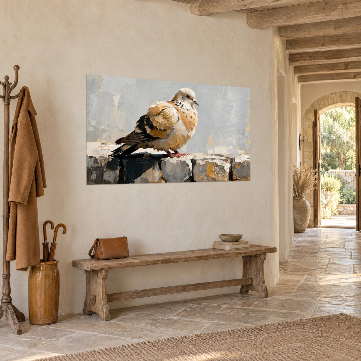 Tableau tourterelle au plumage sable et noir, posée sur un muret de pierre grise, accrochée dans un couloir de maison en pierre