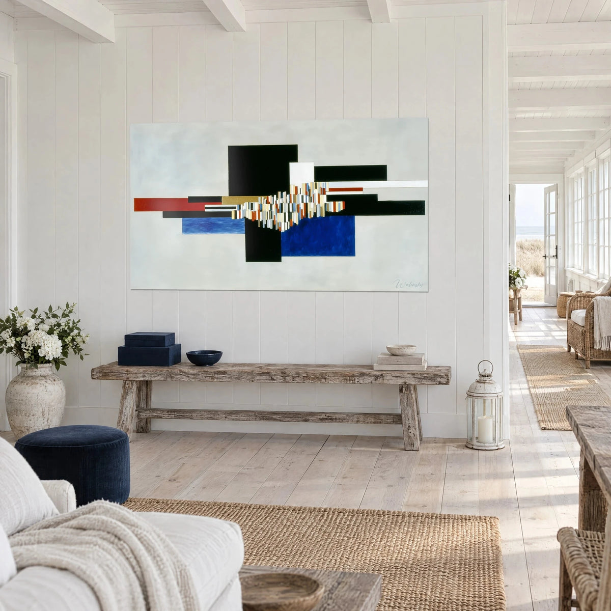 Tableau architecture abstraite de blocs noirs et d'une barre rouge, grappe de lamelles ivoire et bleu pâle, bord de mer, vue de trois-quarts