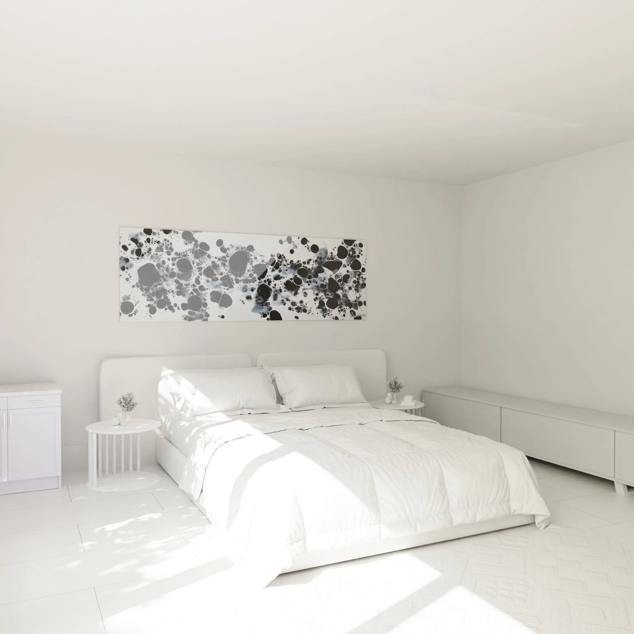 Tableau tacheté noir et blanc de Walensky, ajoutant une touche moderne à une chambre lumineuse