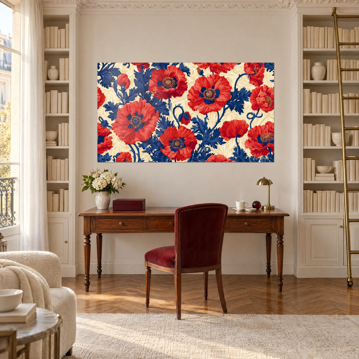 Wall art of coral red poppies with dark centers and navy blue foliage, above a wooden desk and bookshelf