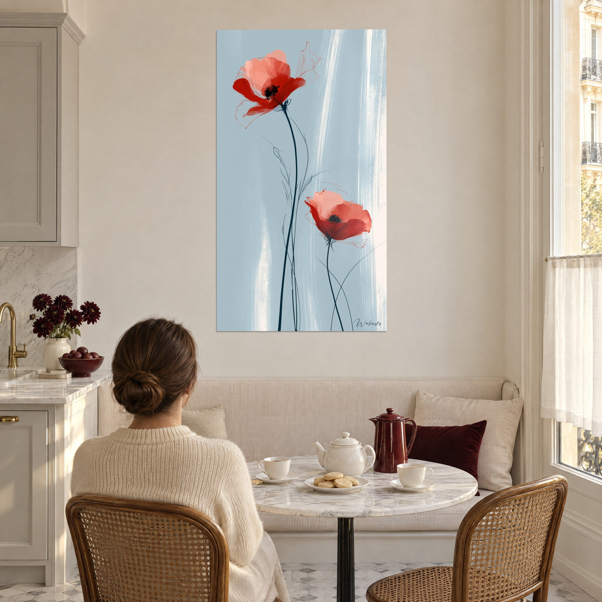 Wall art wild poppies in carmine and peach with black stamens, vertical white brushstrokes on pale blue, in a dining corner by a window