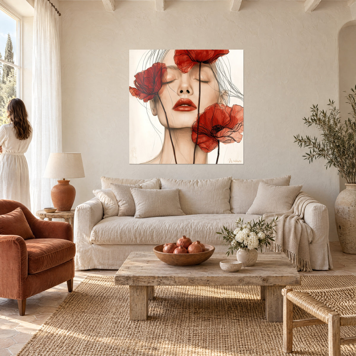 Cuadro rostro de mujer con párpados cerrados, tres amapolas rojo vivo, labios coral, fondo marfil, sobre un sofá en un salón luminoso