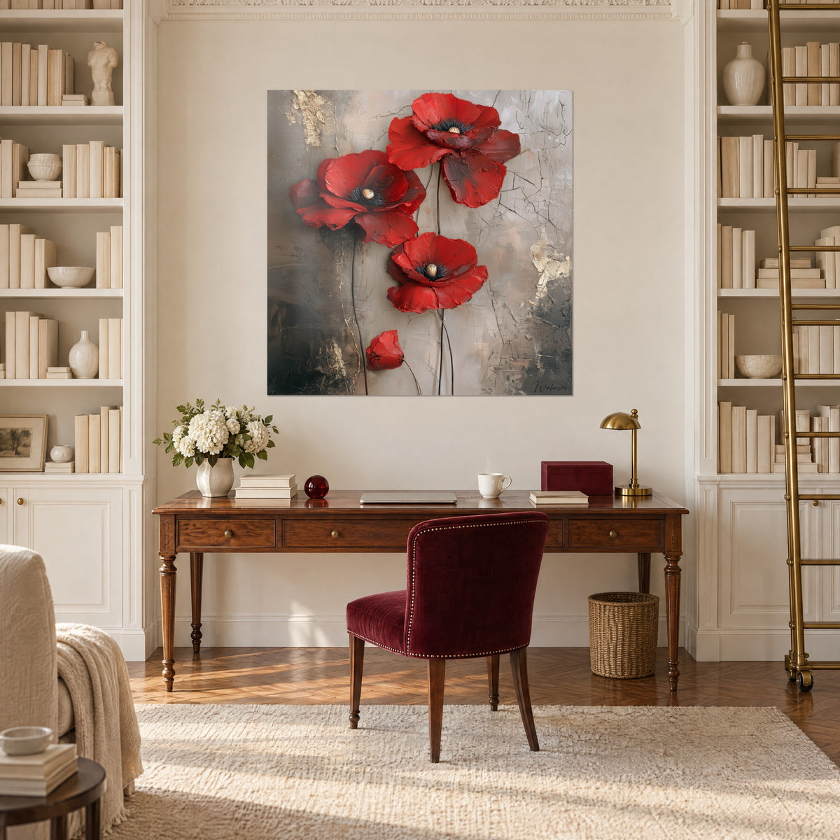 Wall art with crumpled scarlet petals and a red bud on cracked grey-beige background, above a wooden desk between two bookcases