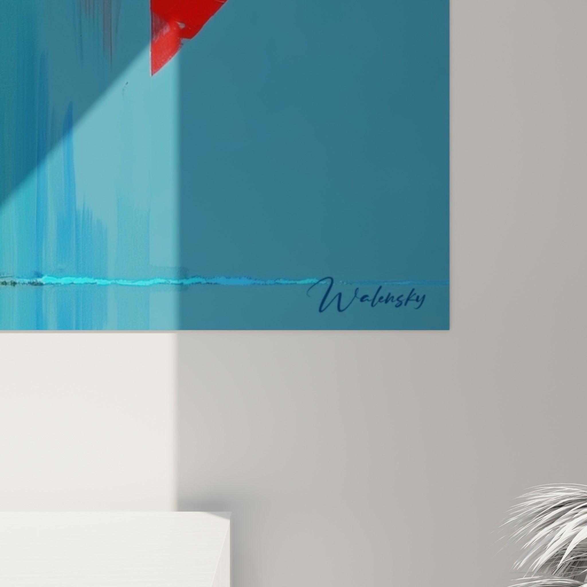 Empâtements de peinture bleu turquoise et rouge orangé se rejoignant sur ce tableau Corps abstrait accroché au mur