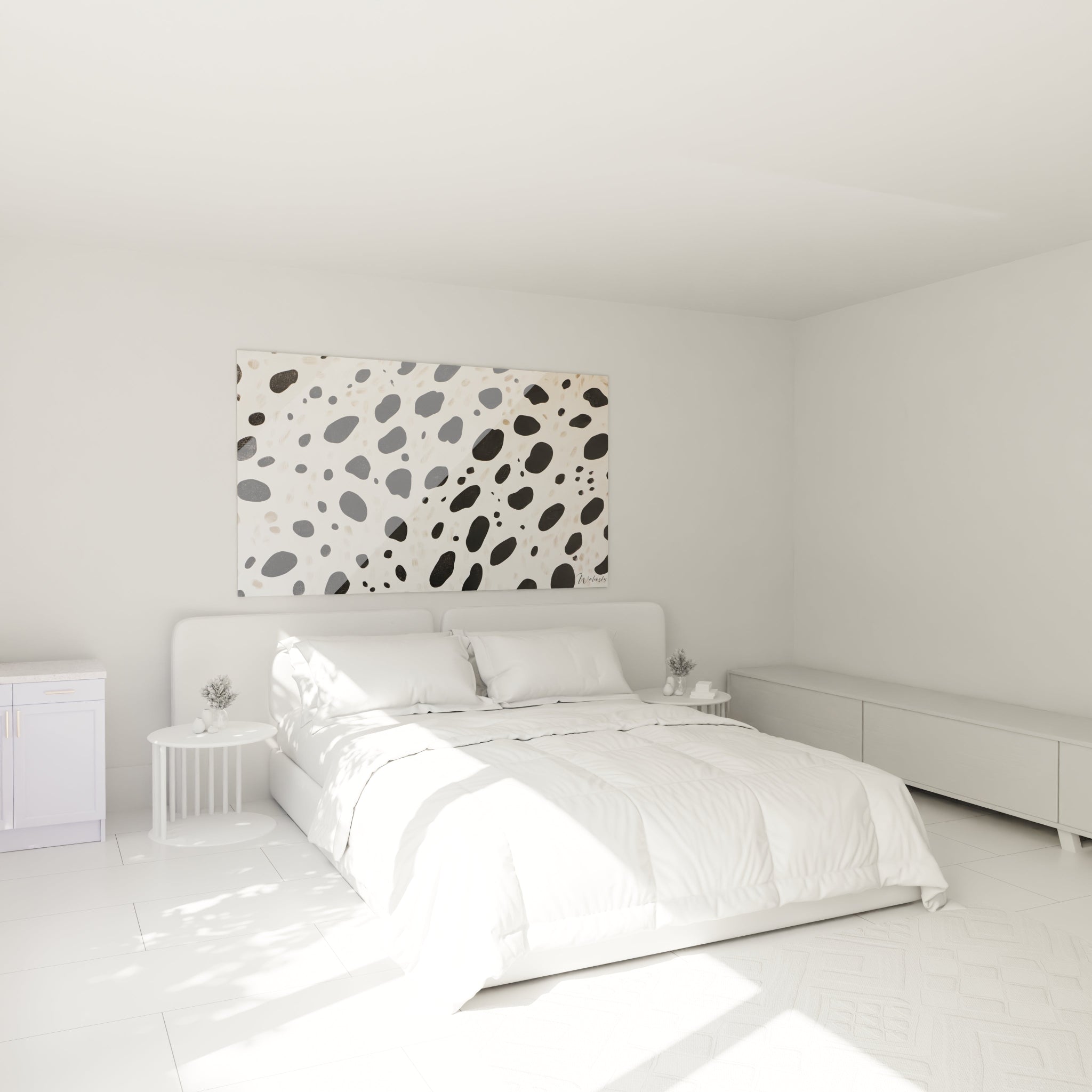 Tableau tacheté noir et blanc de Walensky accroché dans une chambre moderne et lumineuse