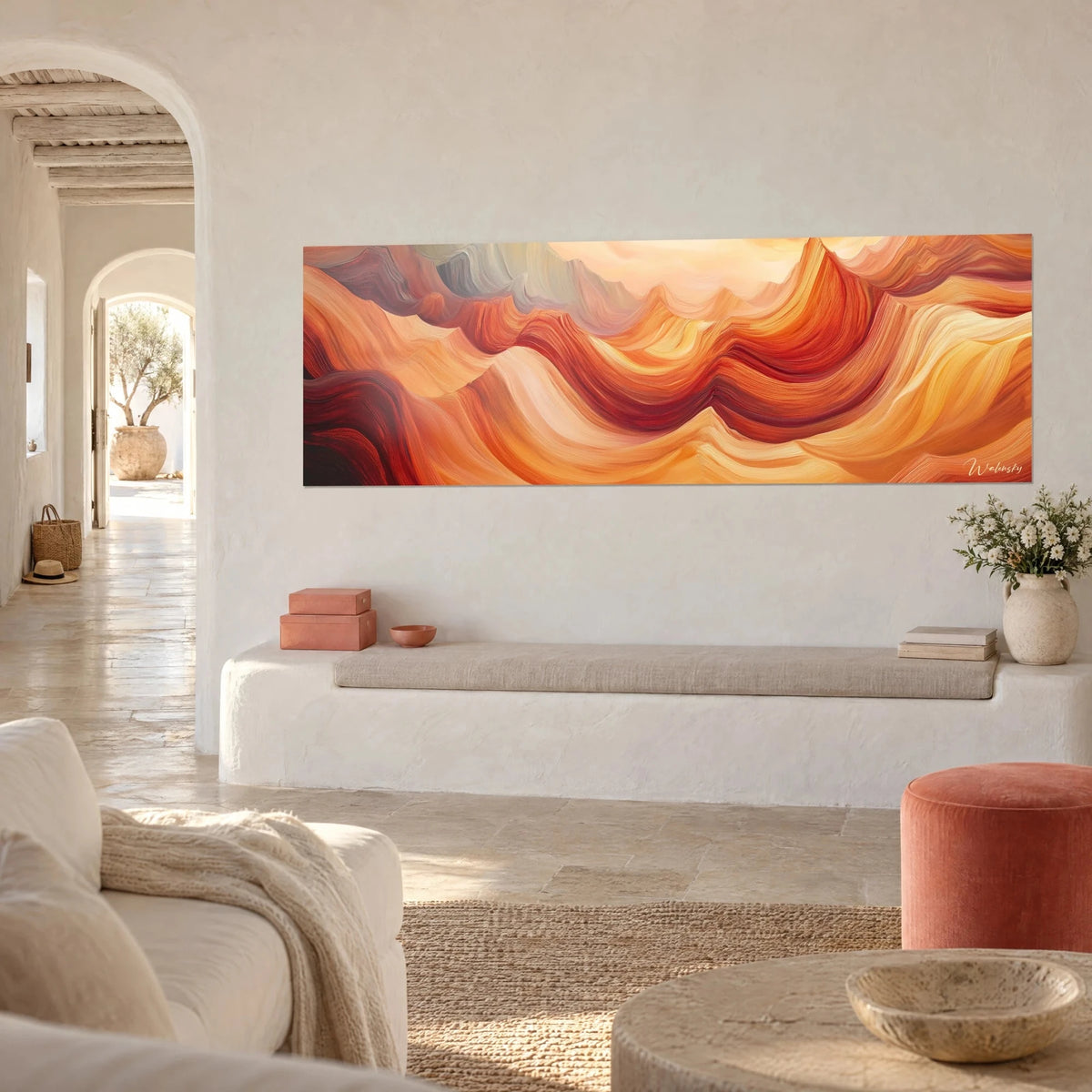 Wall art with an abstract canyon of amber and deep red waves, three-quarter view on a white wall with a stone bench