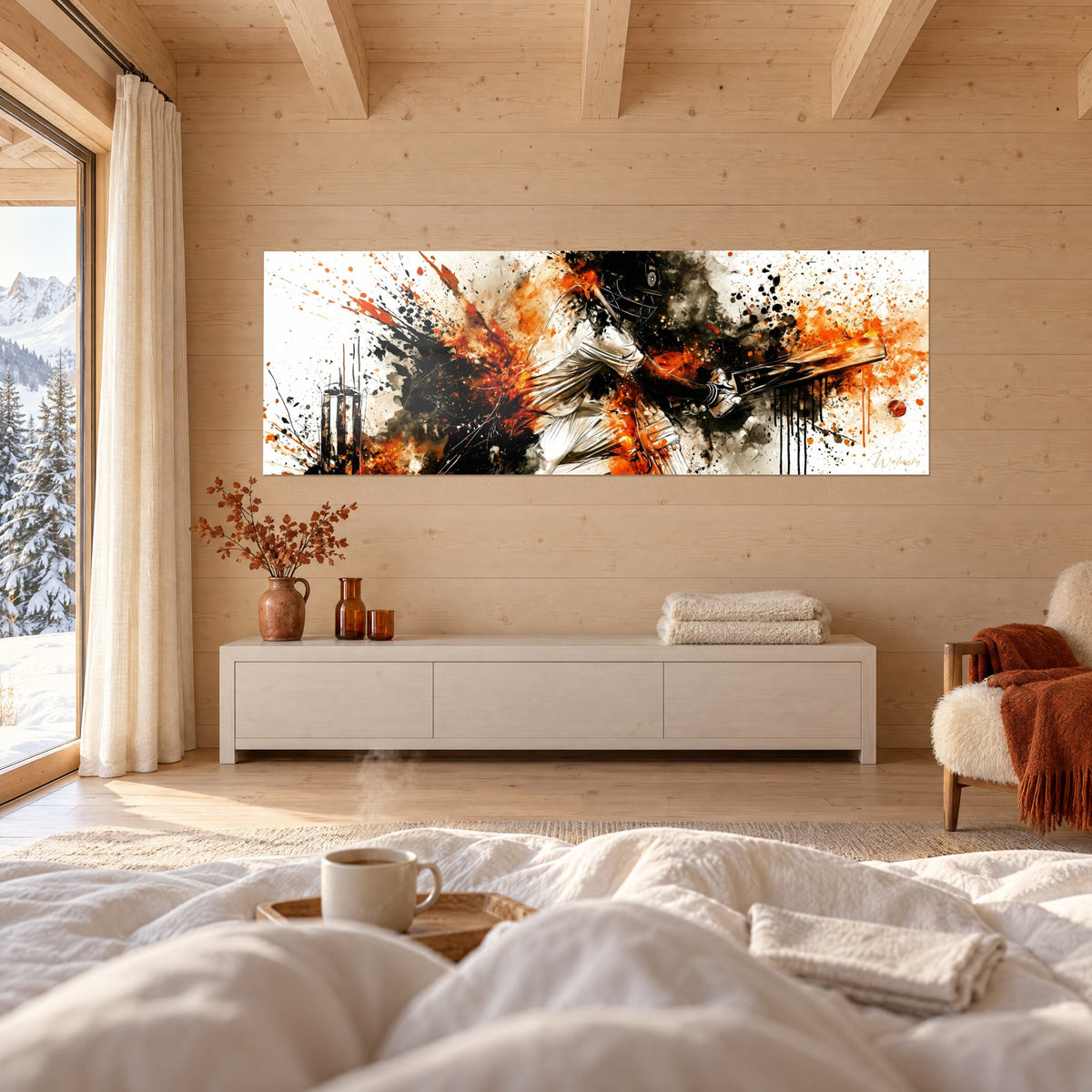 Wall art cricket player silhouette on white background, orange and black splatters, red ball, above a bed in a bright bedroom