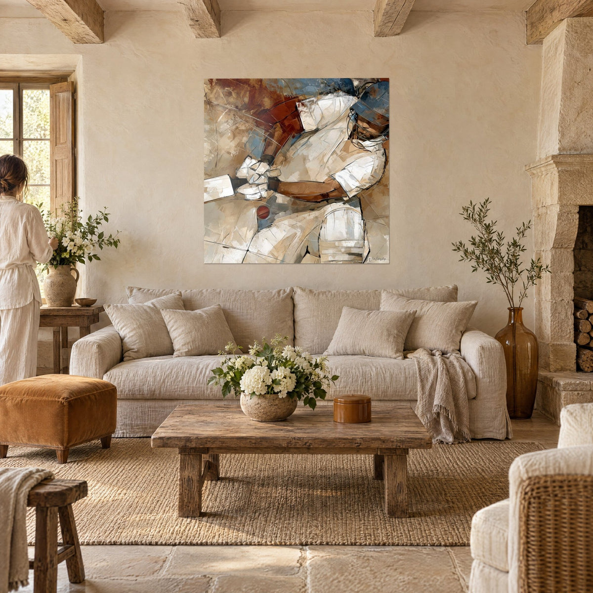 Tableau batteur de cricket en blanc crème et brun roux, balle rouge sous la batte, couple de dos au-dessus d'un canapé dans un salon lumineux