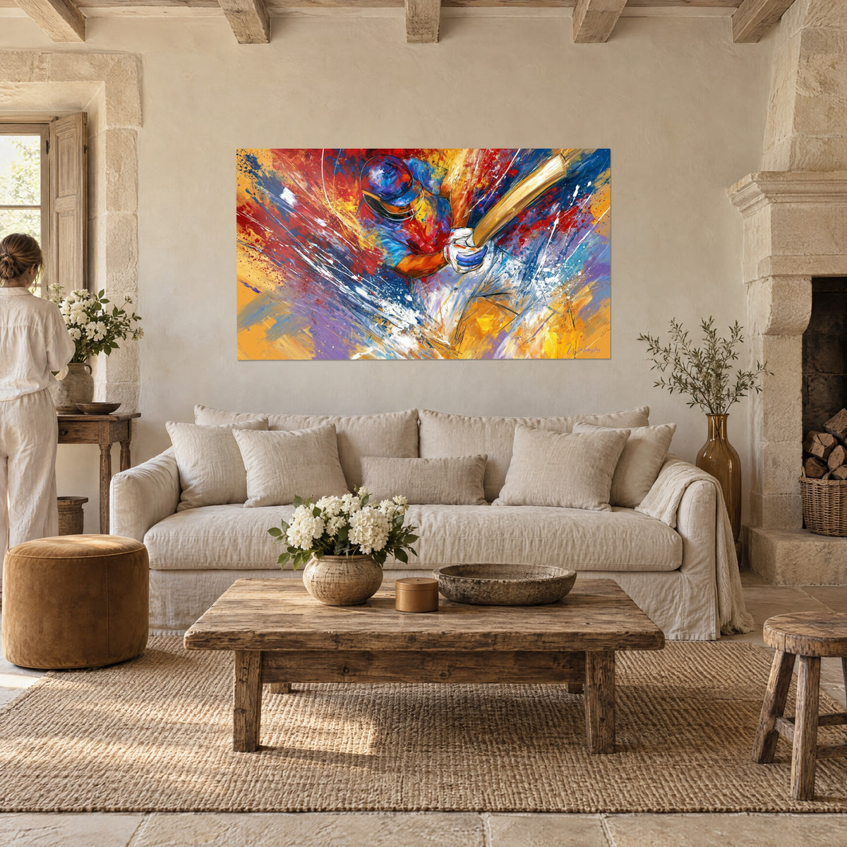 Wall art cricket batsman in helmet swinging his ochre bat, red and violet splashes, above a sofa in a bright living room