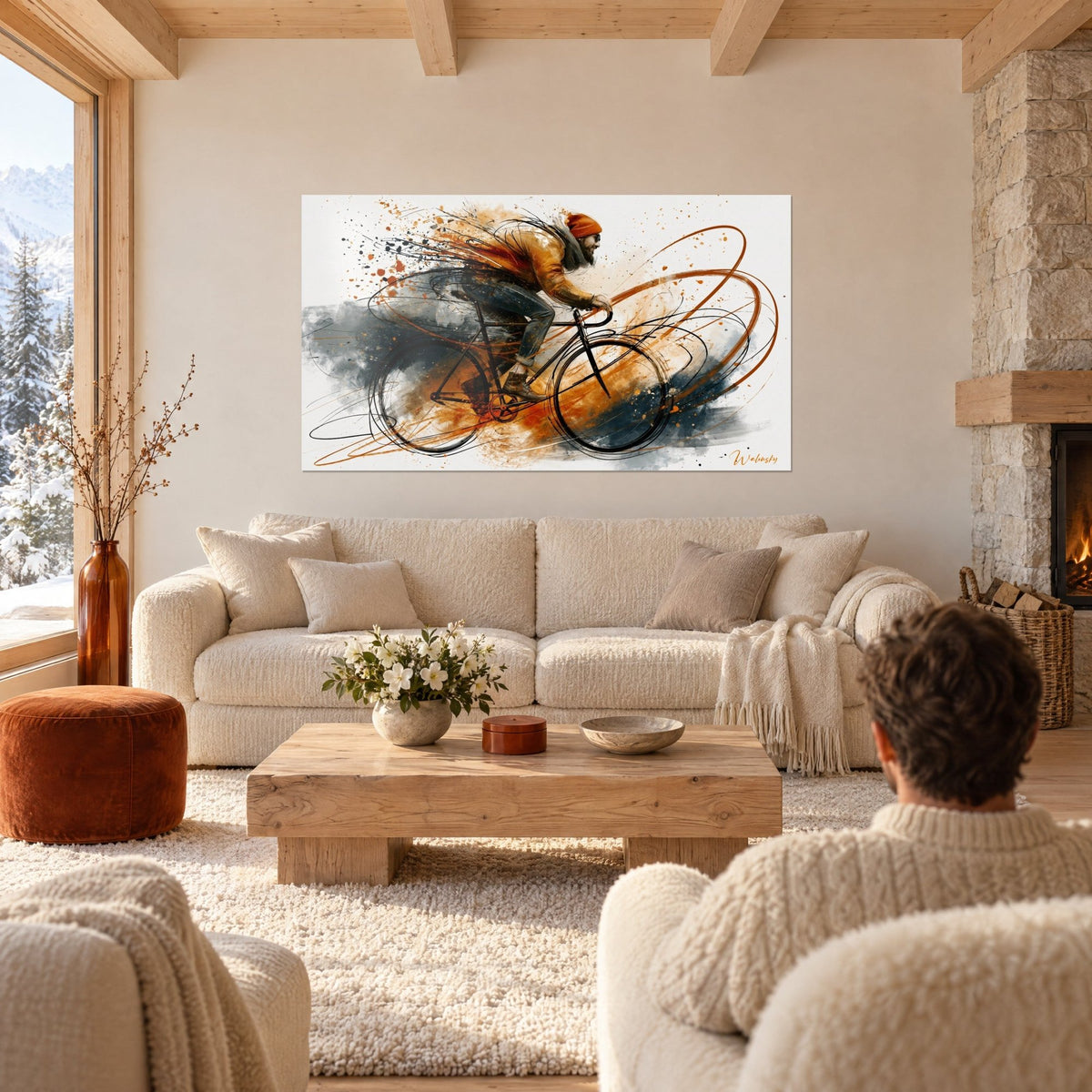 Wall art bearded cyclist in an orange beanie pedalling through ochre and charcoal streaks, above a sofa in a bright living room